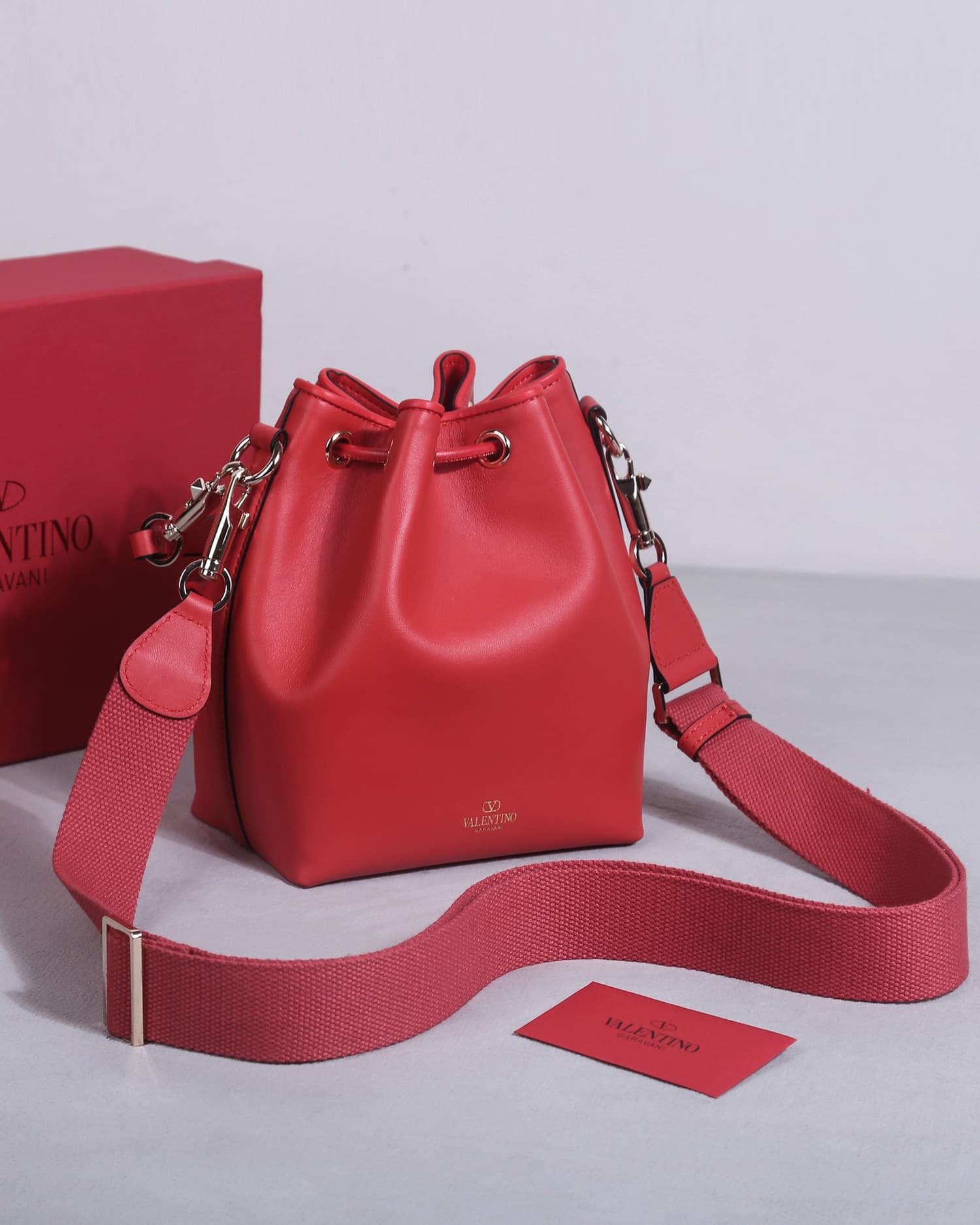Valentino Garavani Locò calfskin leather bucket bag in red 22058 High
