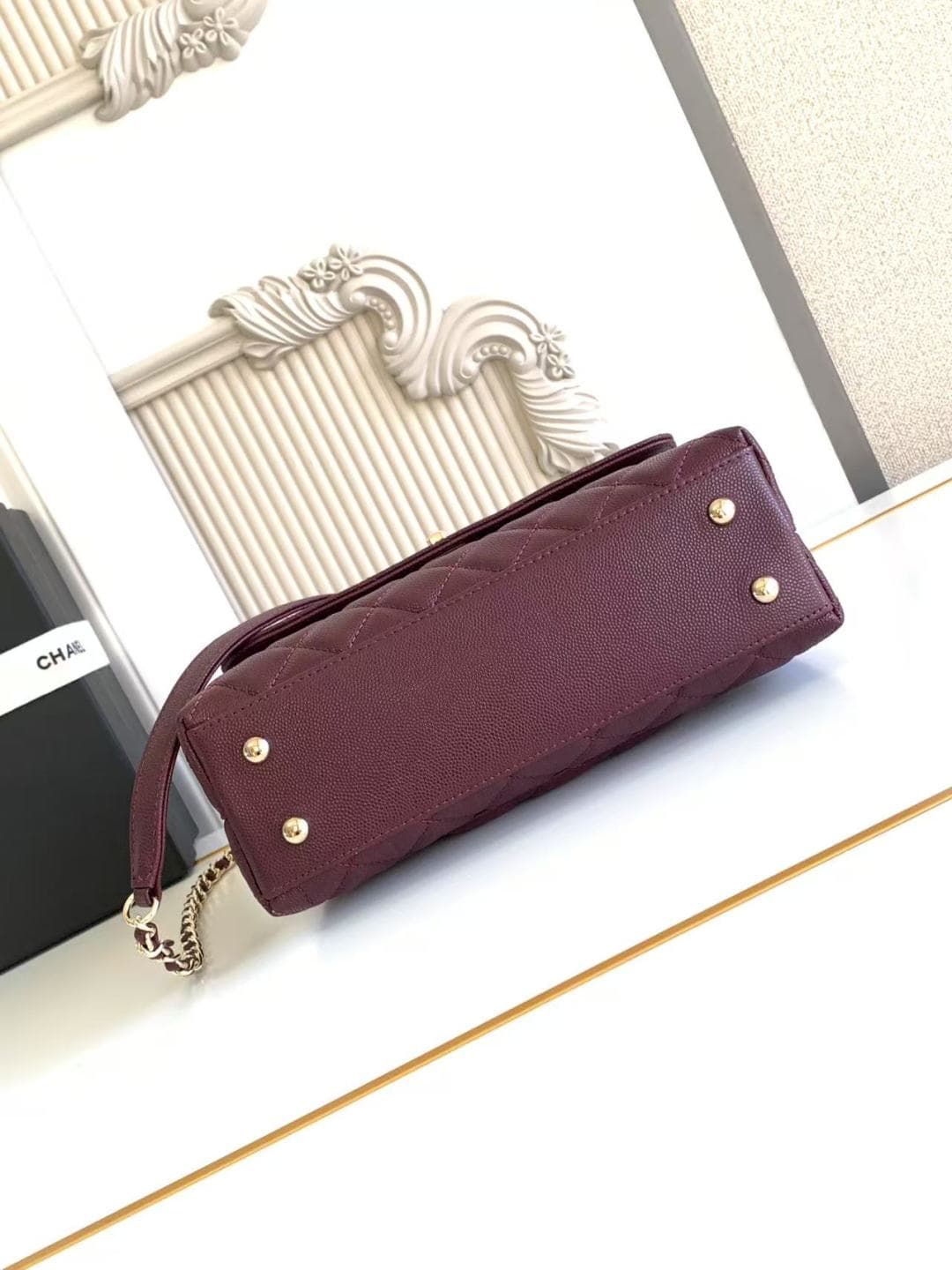 FLAP BAG WITH TOP HANDLE Grained Calfskin & Gold-Tone Metal A92990 Burgundy Binding A