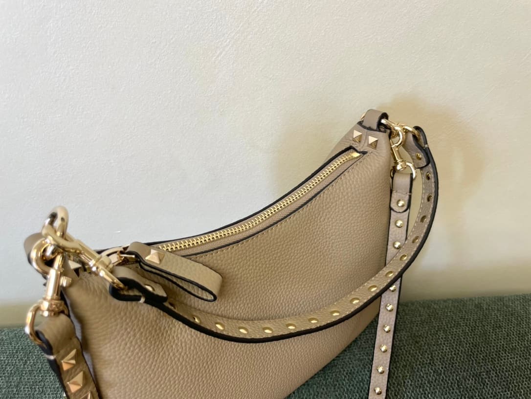Valentino Garavani Rockstud Hobo bag in grainy beige calfskin high