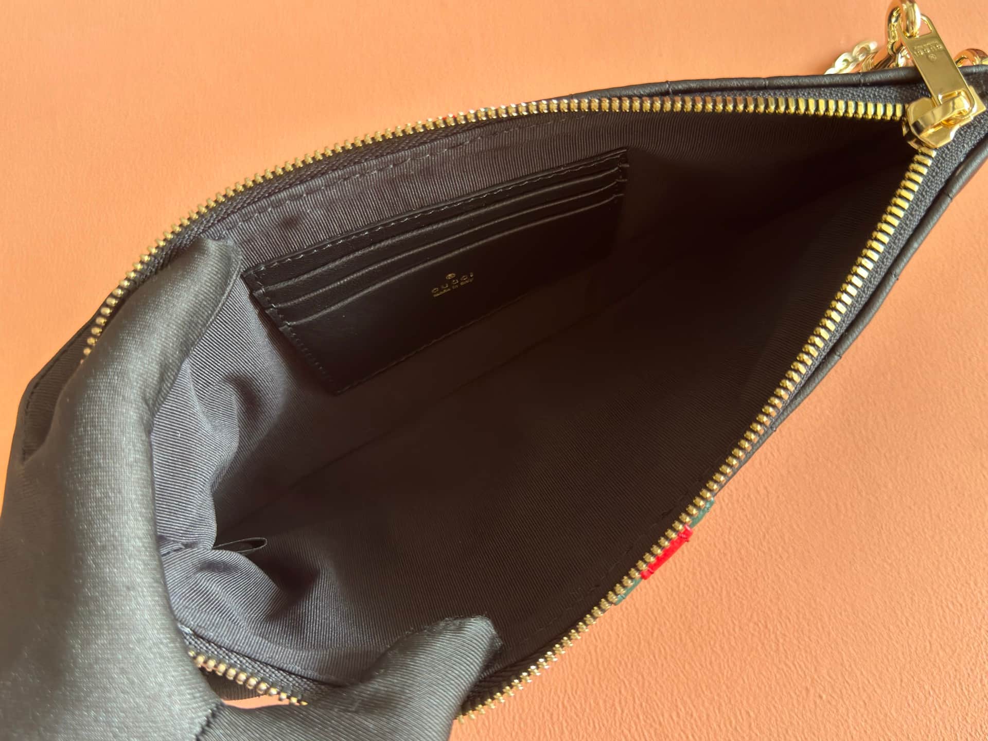 Gucci GG Marmont pouch with strap Black vertical matelassé nappa leather A006X2 High