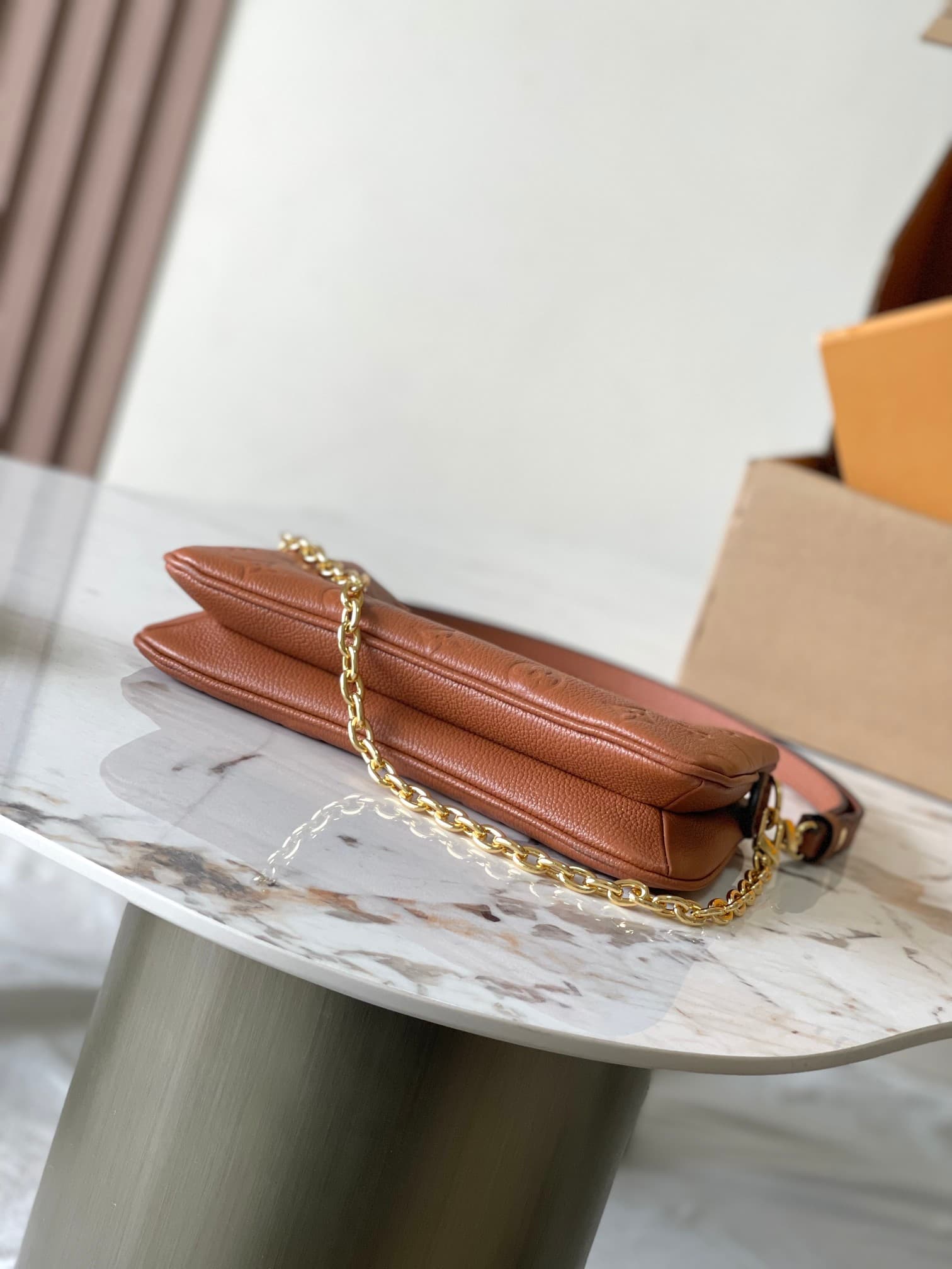 Louis Vuitton Pochette Liv Cognac Monogram Empreinte embossed supple grained cowhide leather M11916 TOP