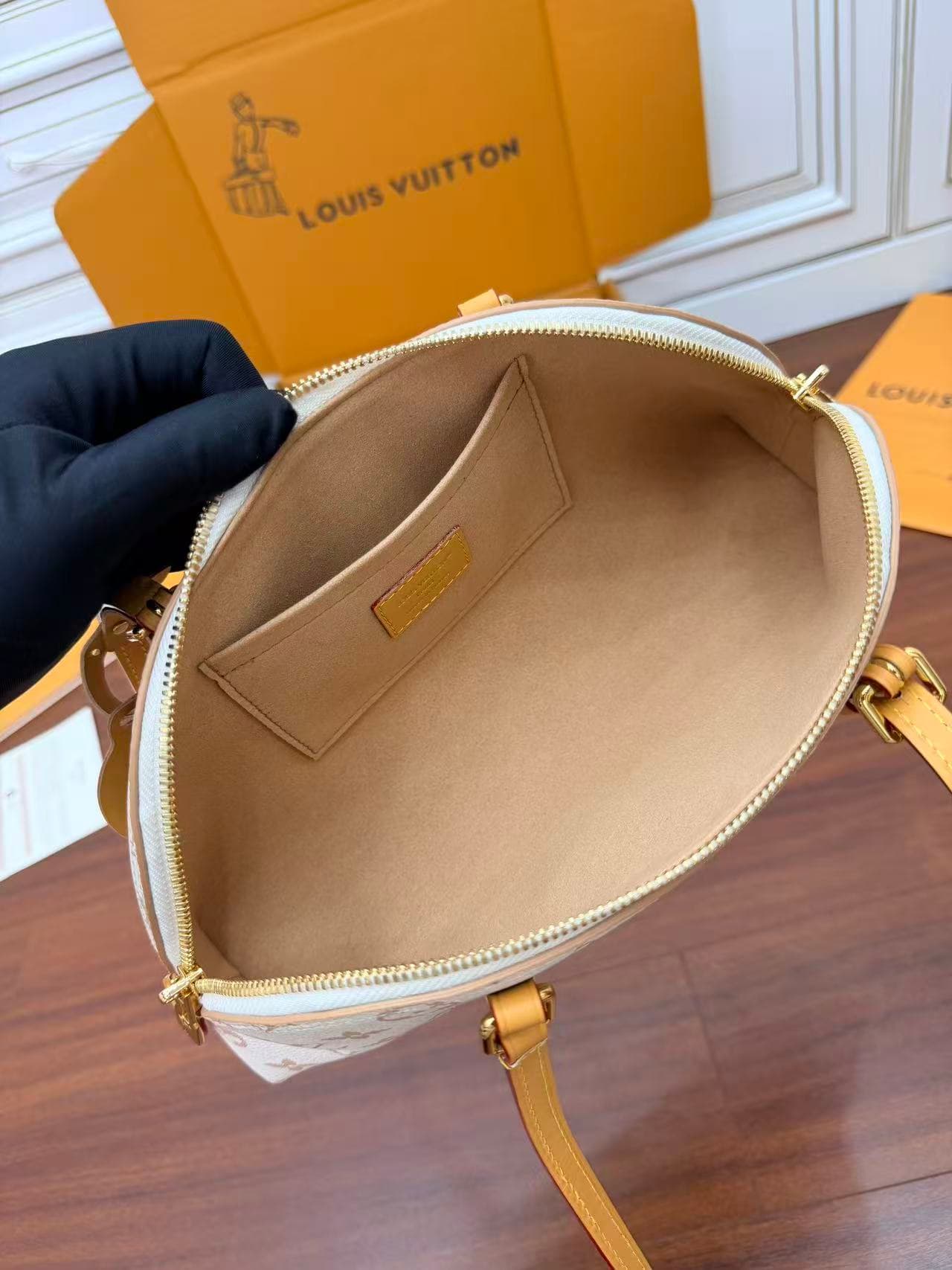 Louis Vuitton Squire East-West Monogram Dune coated canvas M2A457 TOP