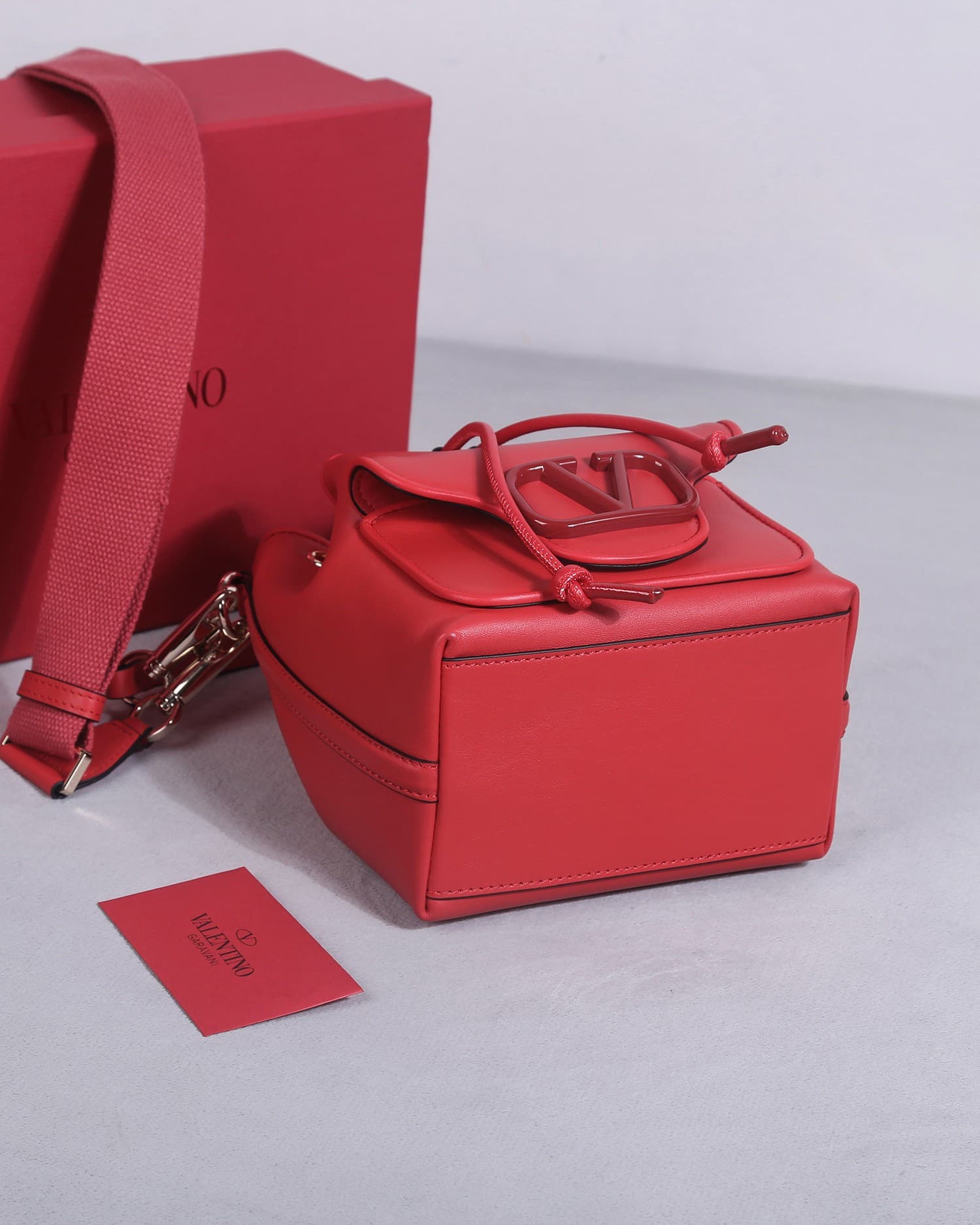 Valentino Garavani Locò calfskin leather bucket bag in red 22058 High