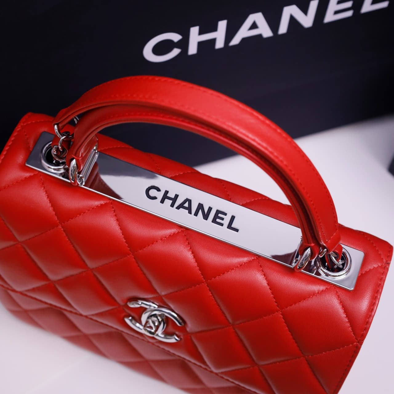 SMALL FLAP BAG WITH TOP HANDLE Lambskin Silver Metal Red A