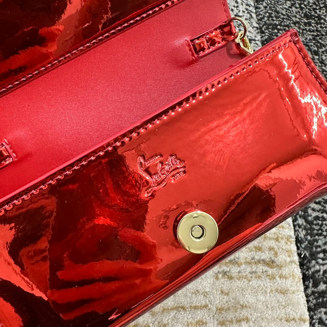 Christian Louboutin Loubi54 patent leather shoulder bag in red High