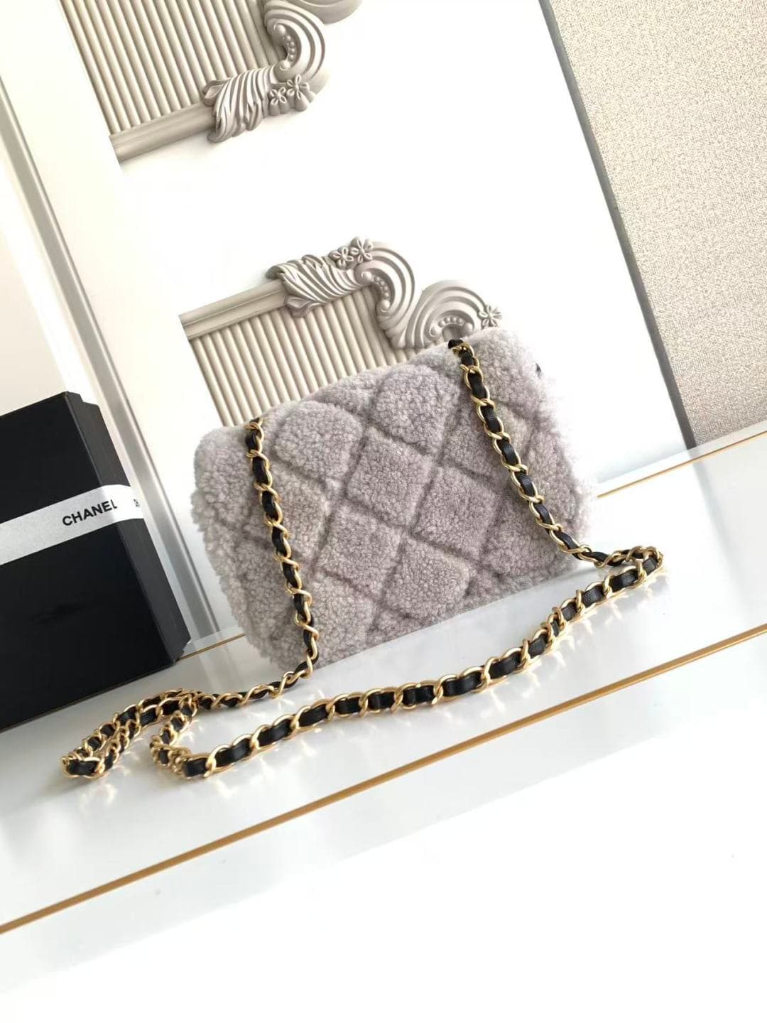 Chanel Mini Shearling Flap Bag in Black lambskin with grey shearling & Gold-Tone Metal AS5148 A