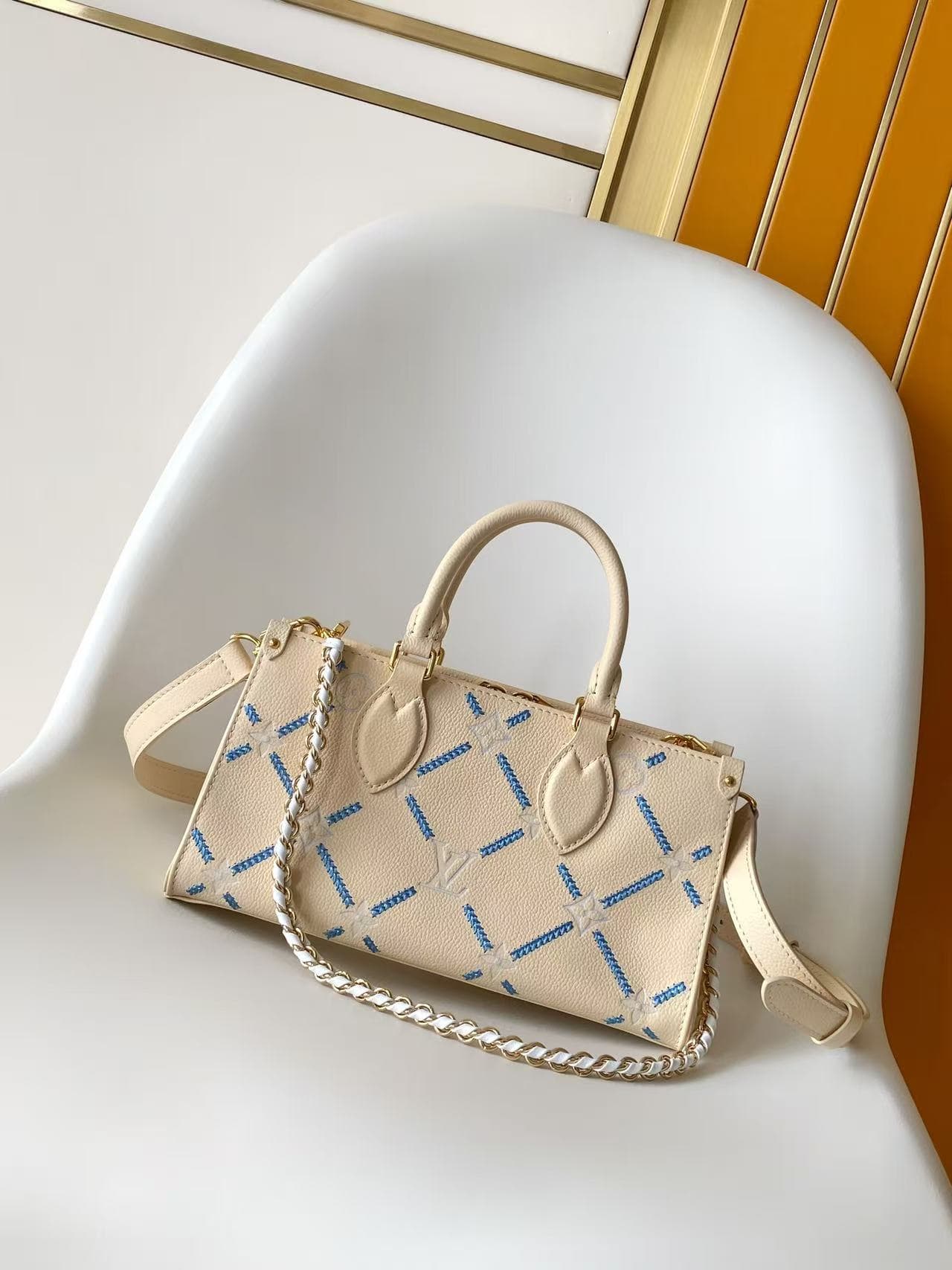 Louis Vuitton Onthego East West Light Bliss Couture Cowhide leather M29487 High