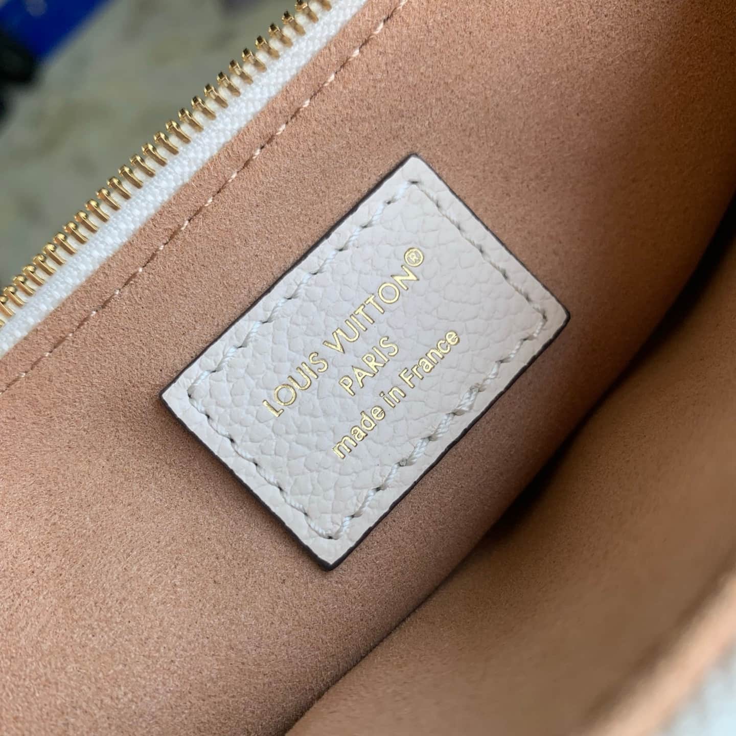 Louis Vuitton Pochette Liv Crème Monogram Empreinte Leather M3A838 High