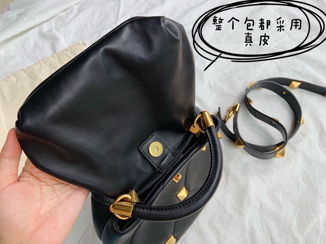 Valentino Garavani Roman Stud leather top handle bag black high