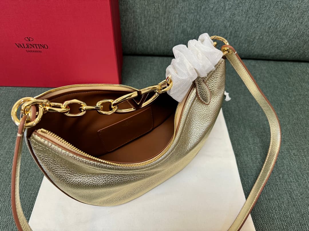 Valentino Garavani VLogo Moon small hobo bag in Gold grained calfskin High