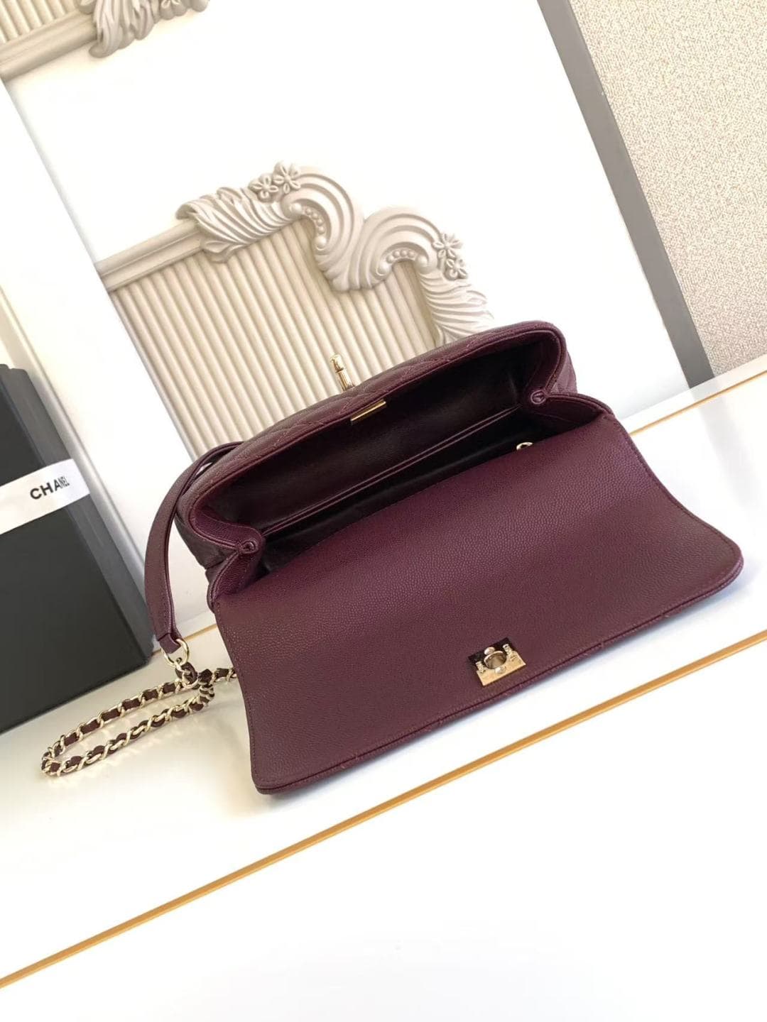 FLAP BAG WITH TOP HANDLE Grained Calfskin & Gold-Tone Metal A92990 Burgundy Binding A