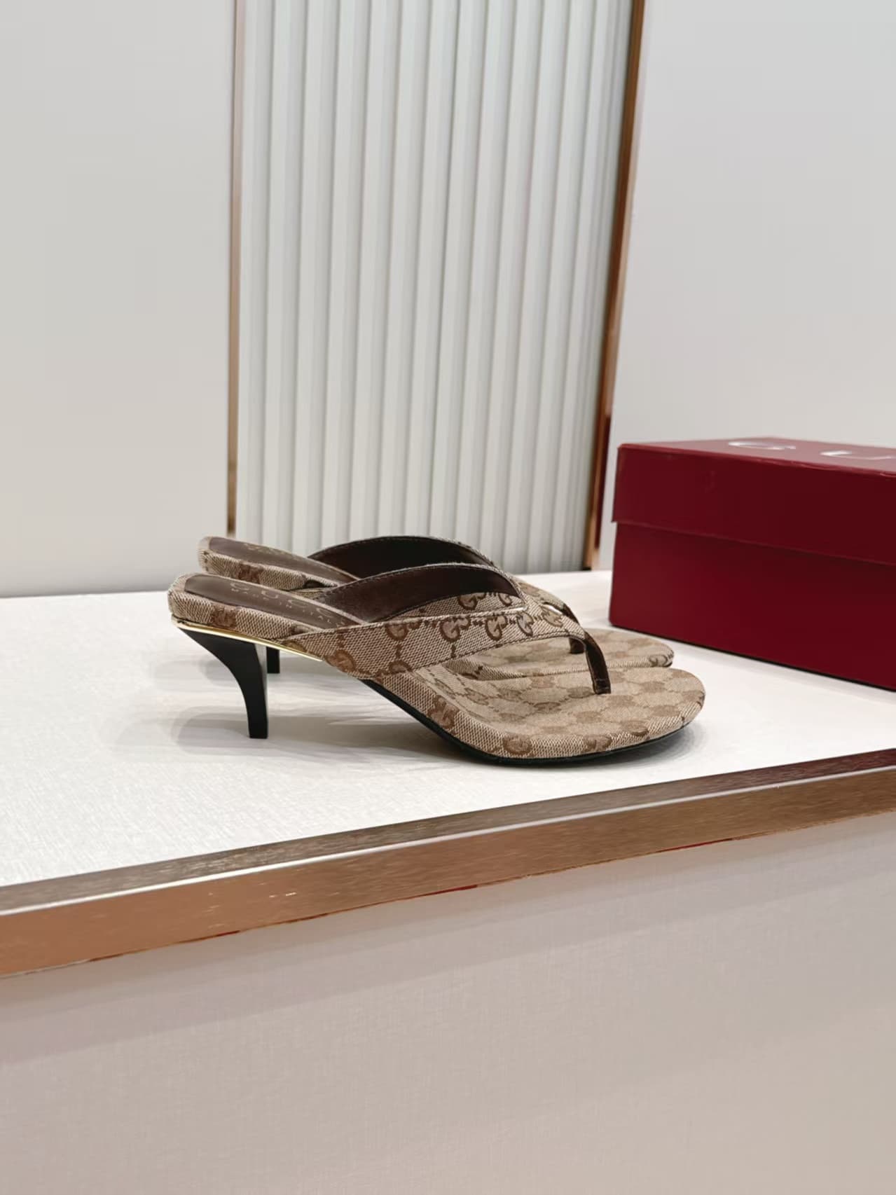 Gucci Women's Vittoria thong sandals in sand and brown GG canvas