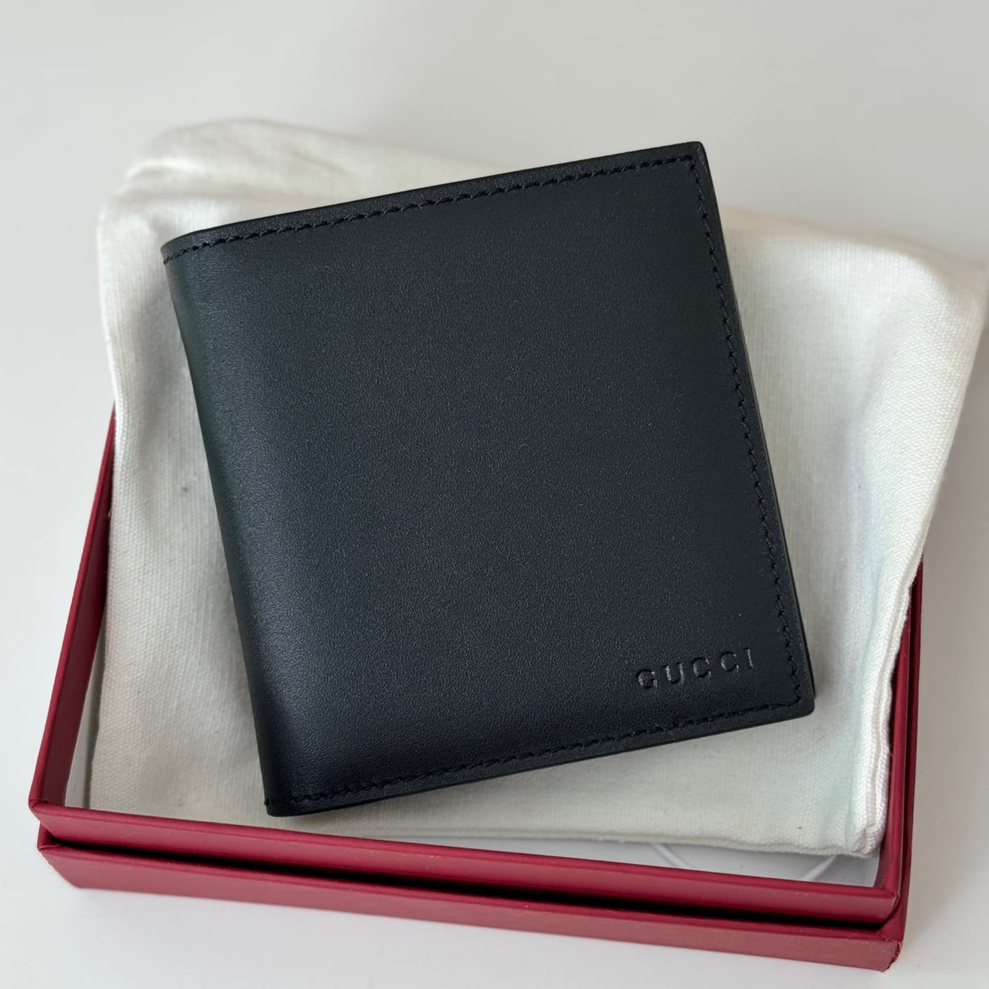 GG Emblem bi-fold wallet with GG fabric Black smooth leather 818949  High