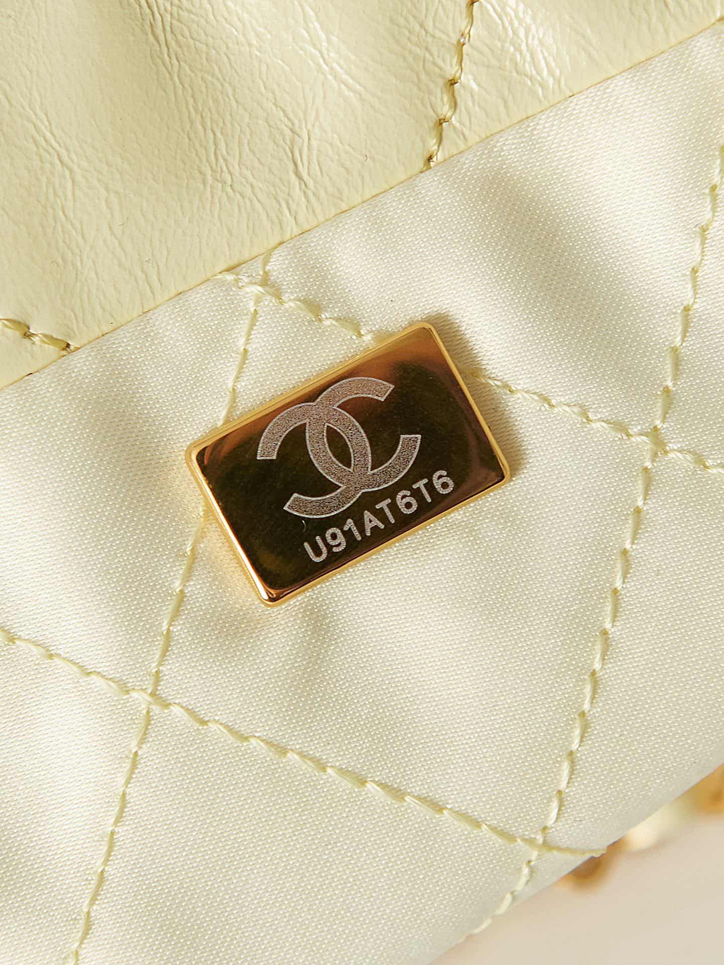 Chanel 22 MINI HANDBAG Shiny Calfskin Light Yellow & Gold-Tone Metal AS3980 A