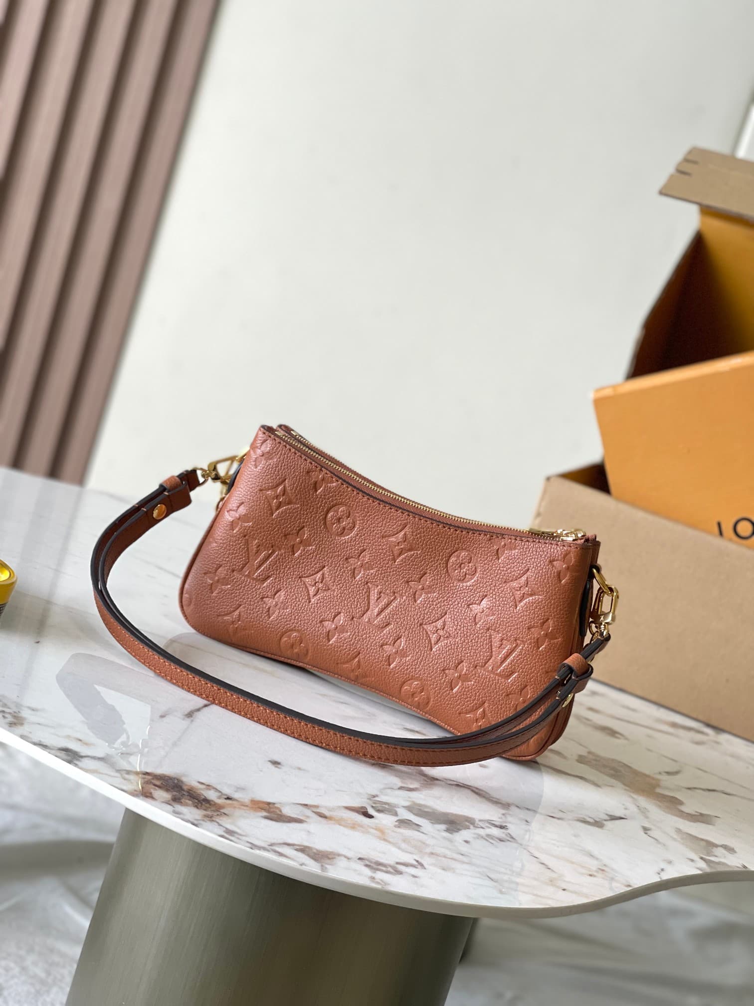 Louis Vuitton Pochette Liv Cognac Monogram Empreinte embossed supple grained cowhide leather M11916 TOP