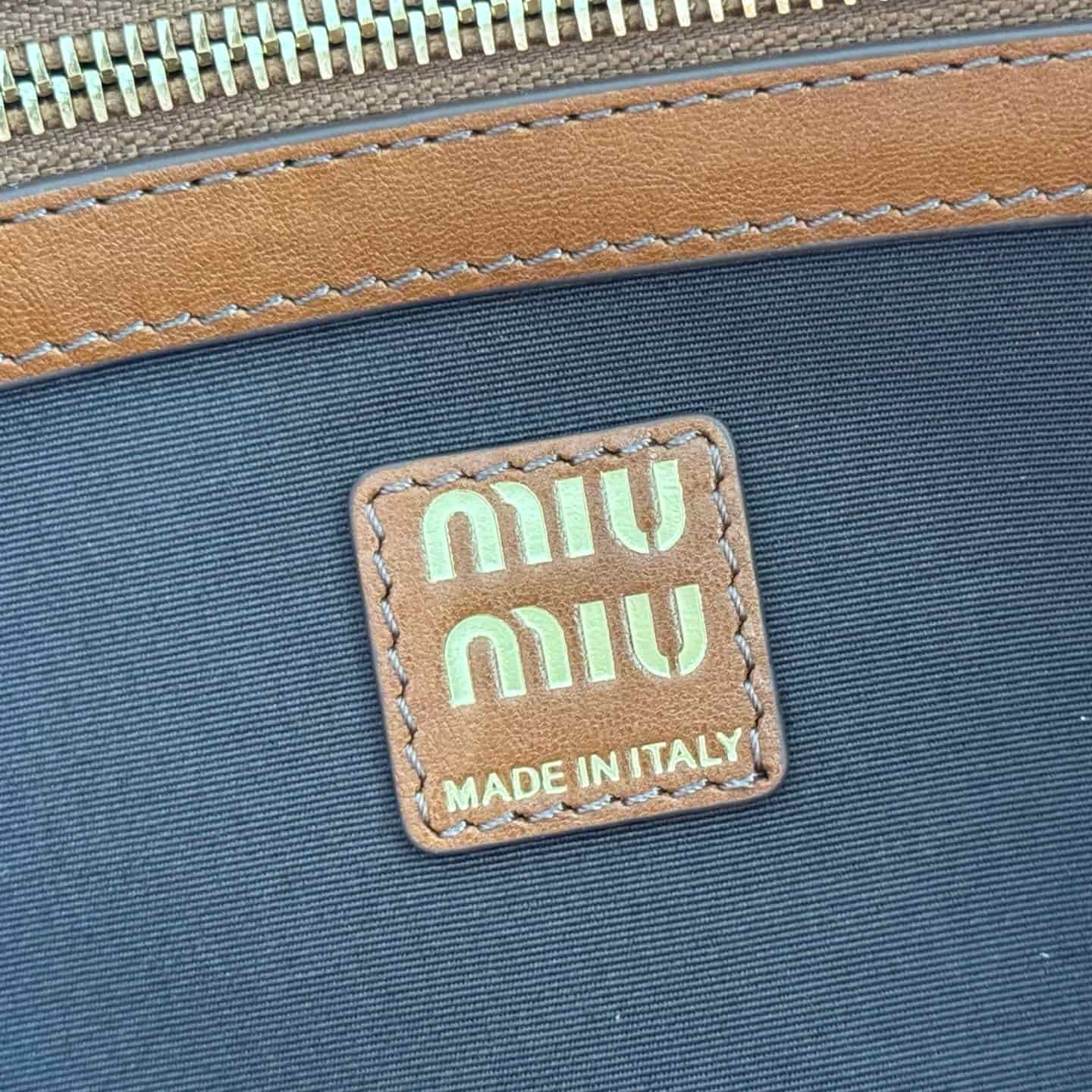 Miu Miu Caprice Calfskin leather clutch Cognac 5BF133