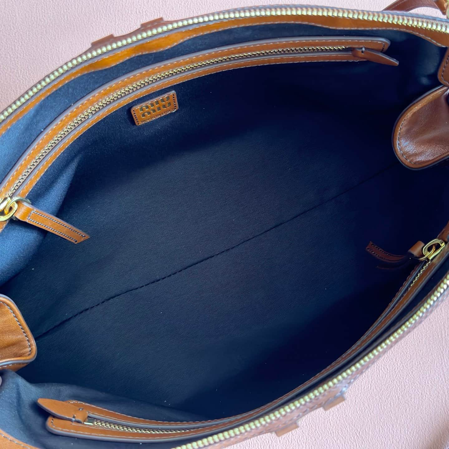 Miu Miu Caprice Calfskin leather clutch Cognac 5BF133