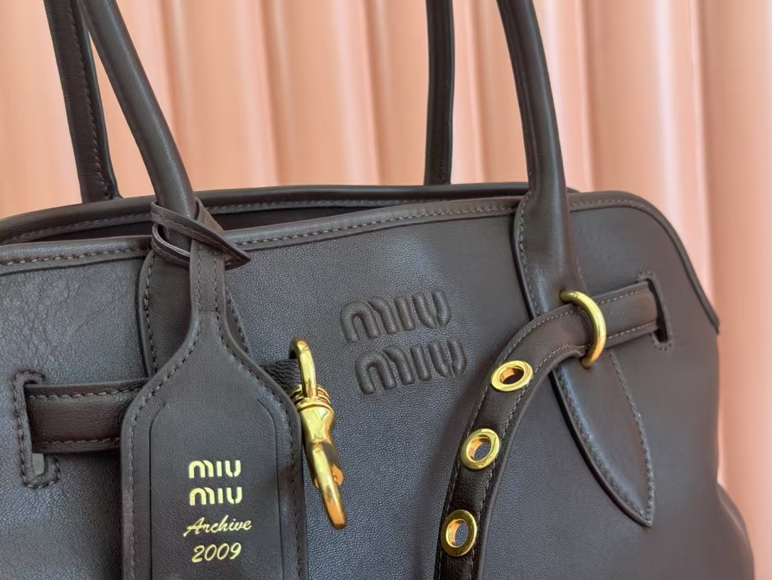 Miu Miu Aventure nappa leather Medium bag in Briarwood Top