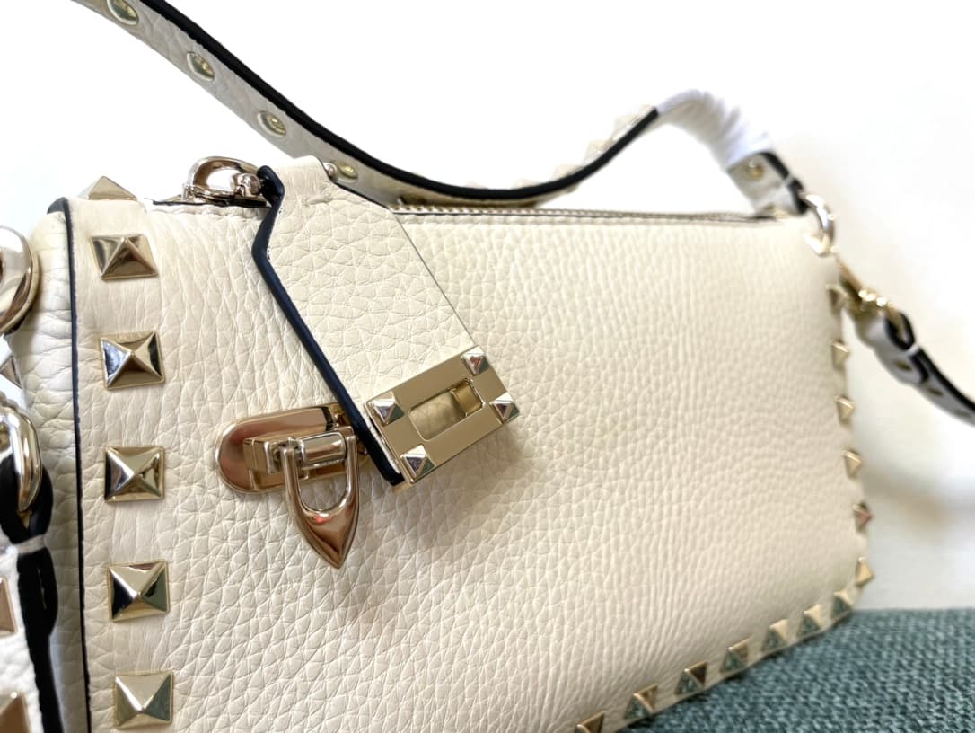 Valentino Garavani Mini Rockstud crossbody bag in White Grained Calfskin High