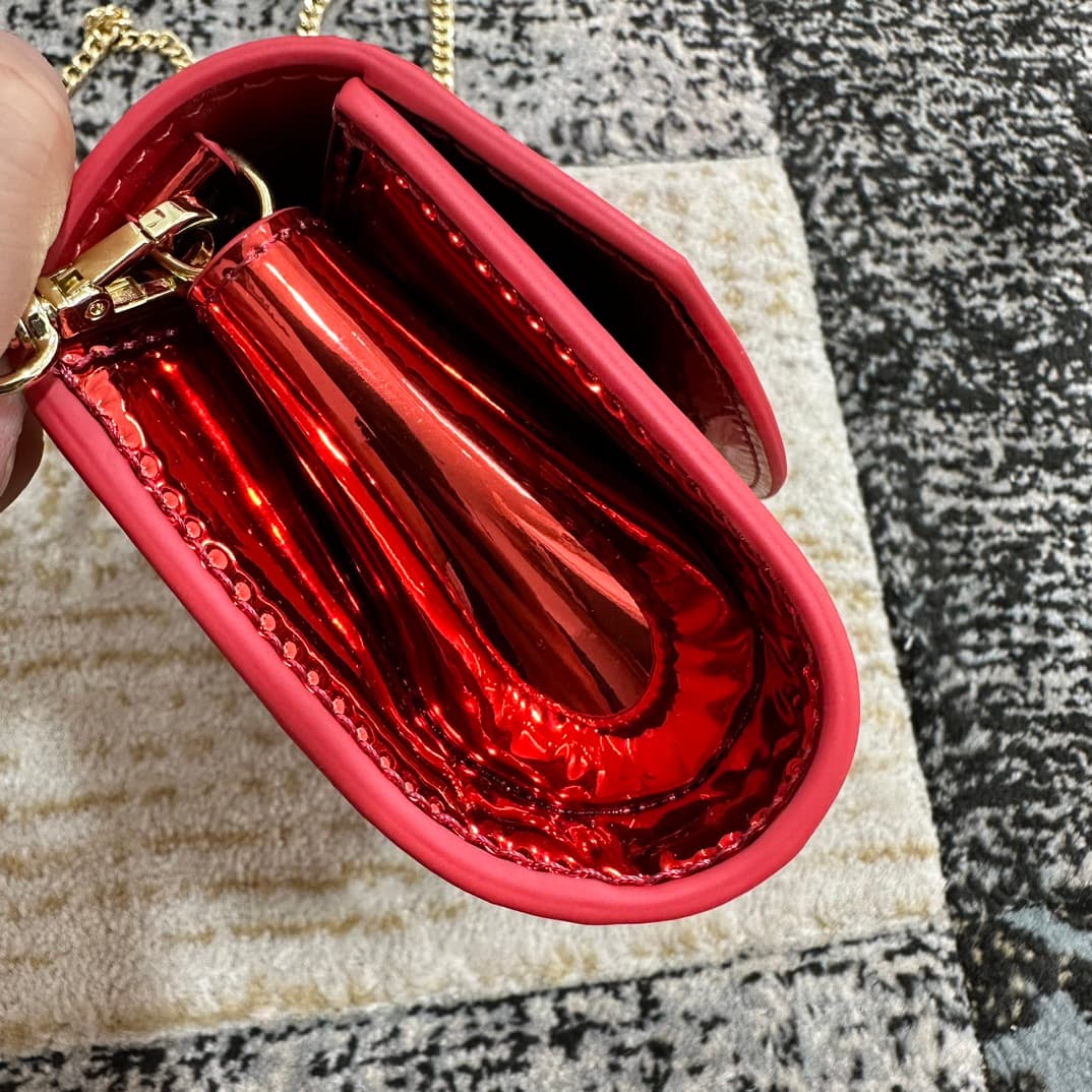Christian Louboutin Loubi54 patent leather shoulder bag in red High