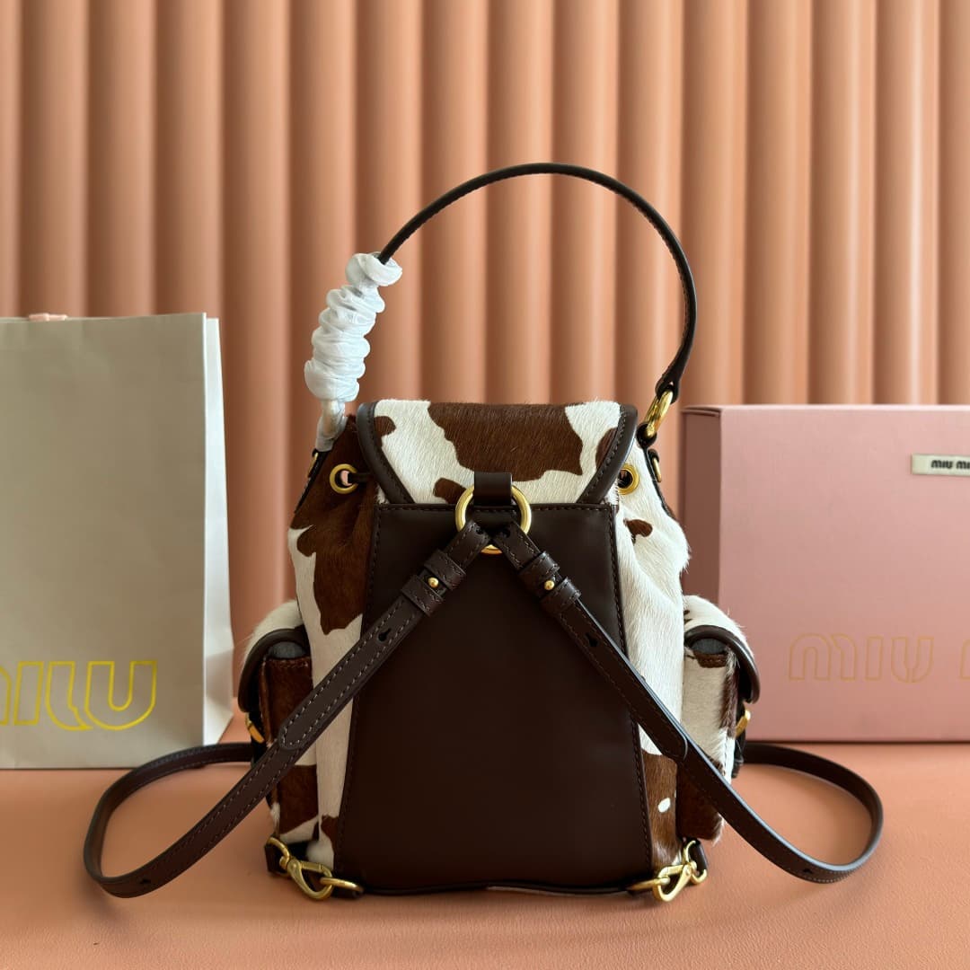 Miu Miu Calf Hair Backpack in brown and white cow print 5BZ043 TOP