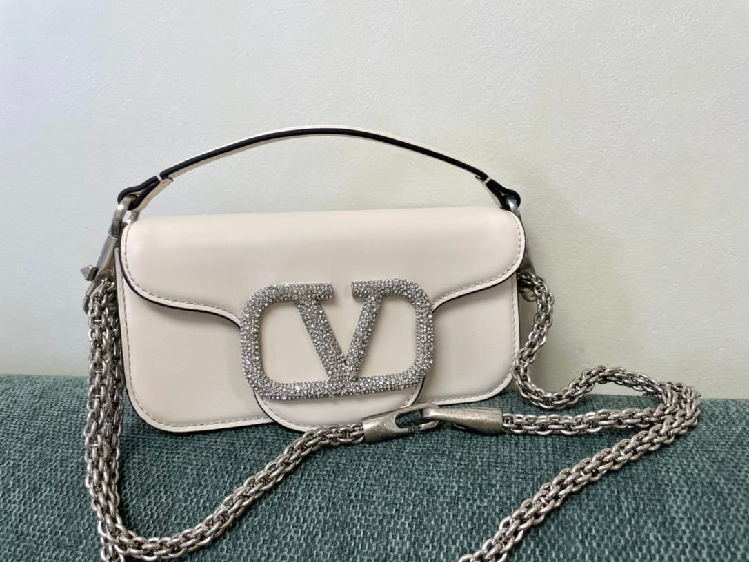 Valentino Garavani Locò Mini leather shoulder bag with crystal VLogo High