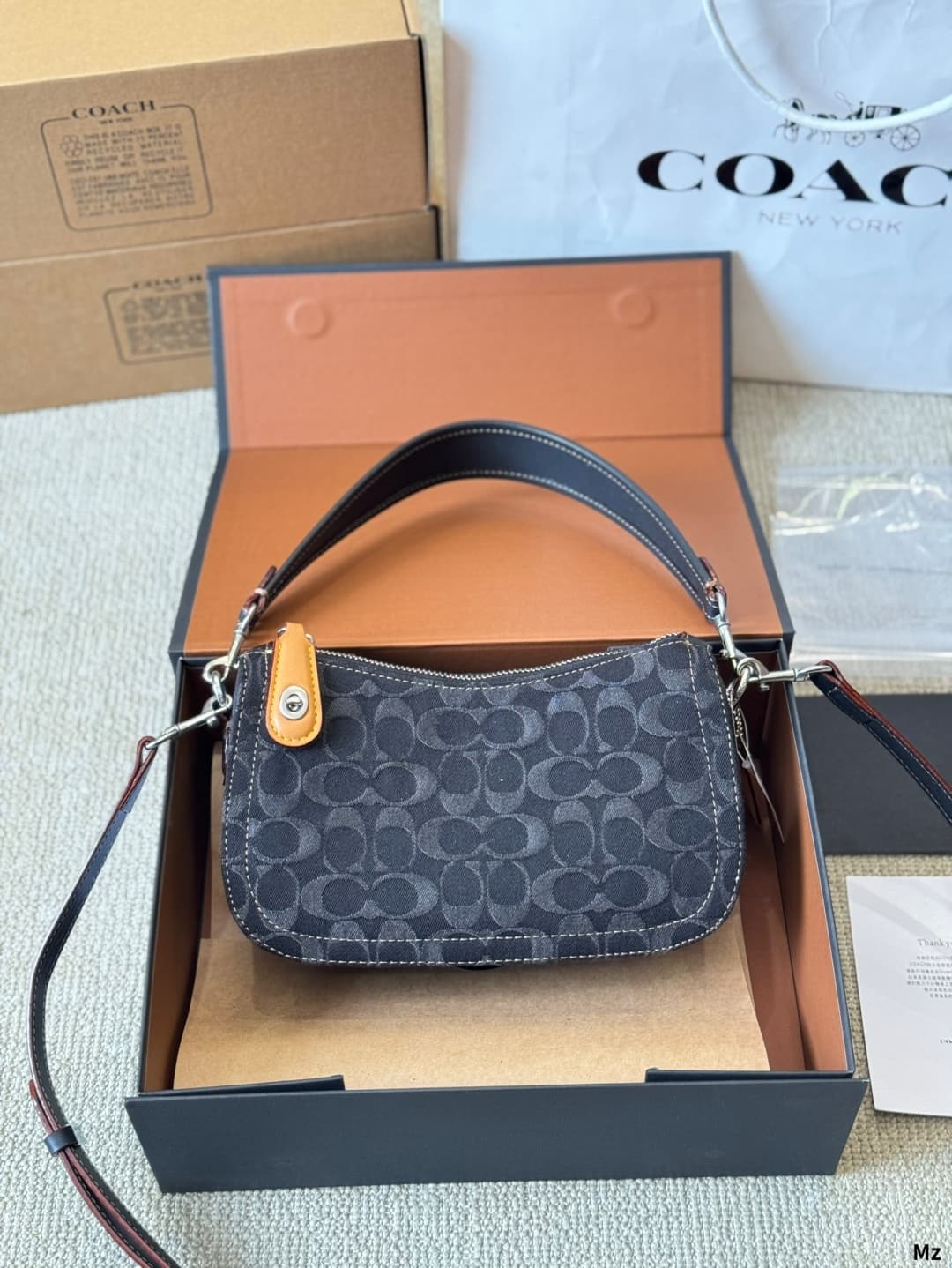 Coach Swinger In Signature Denim