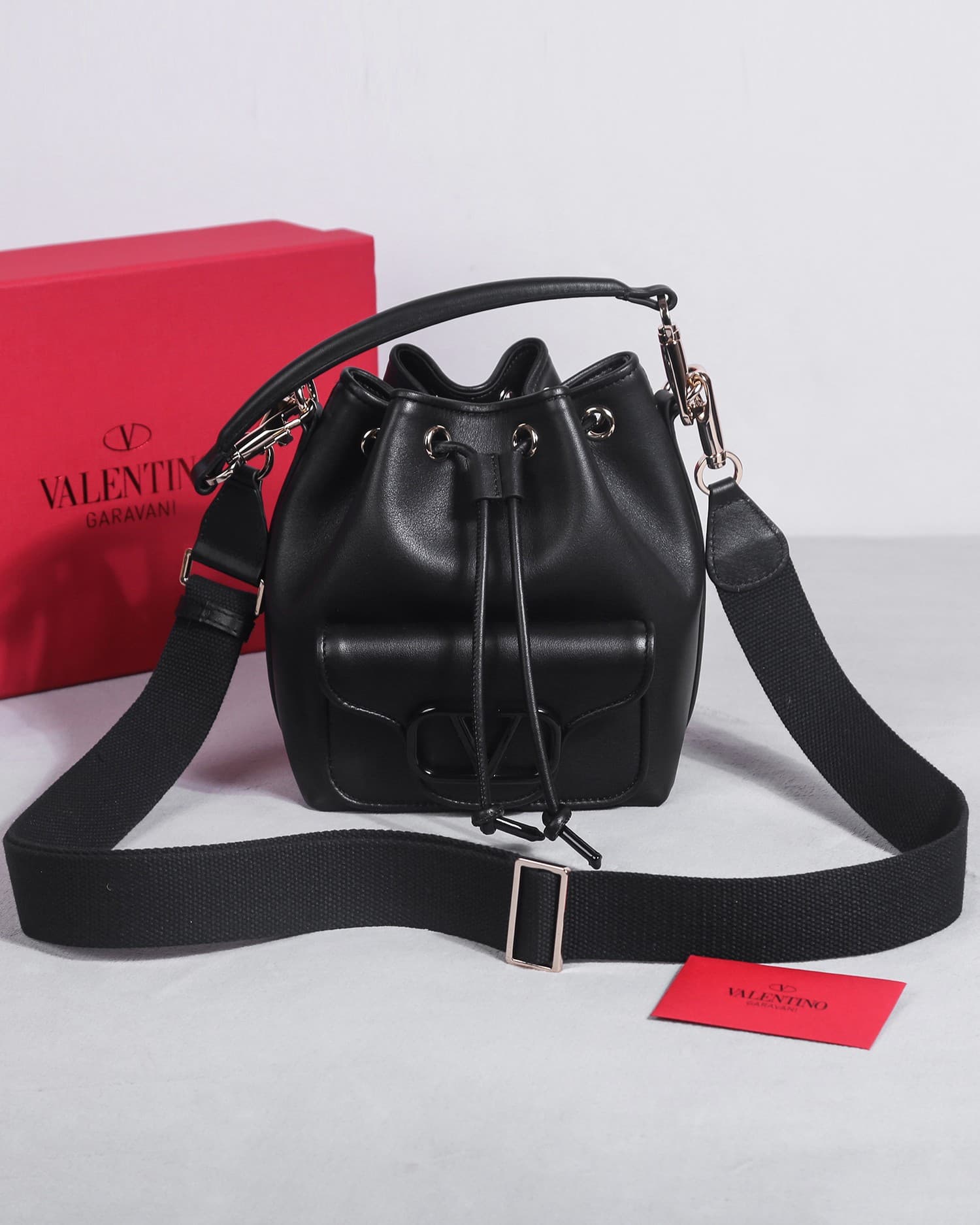 Valentino Garavani Locò calfskin leather bucket bag in black 22058 High