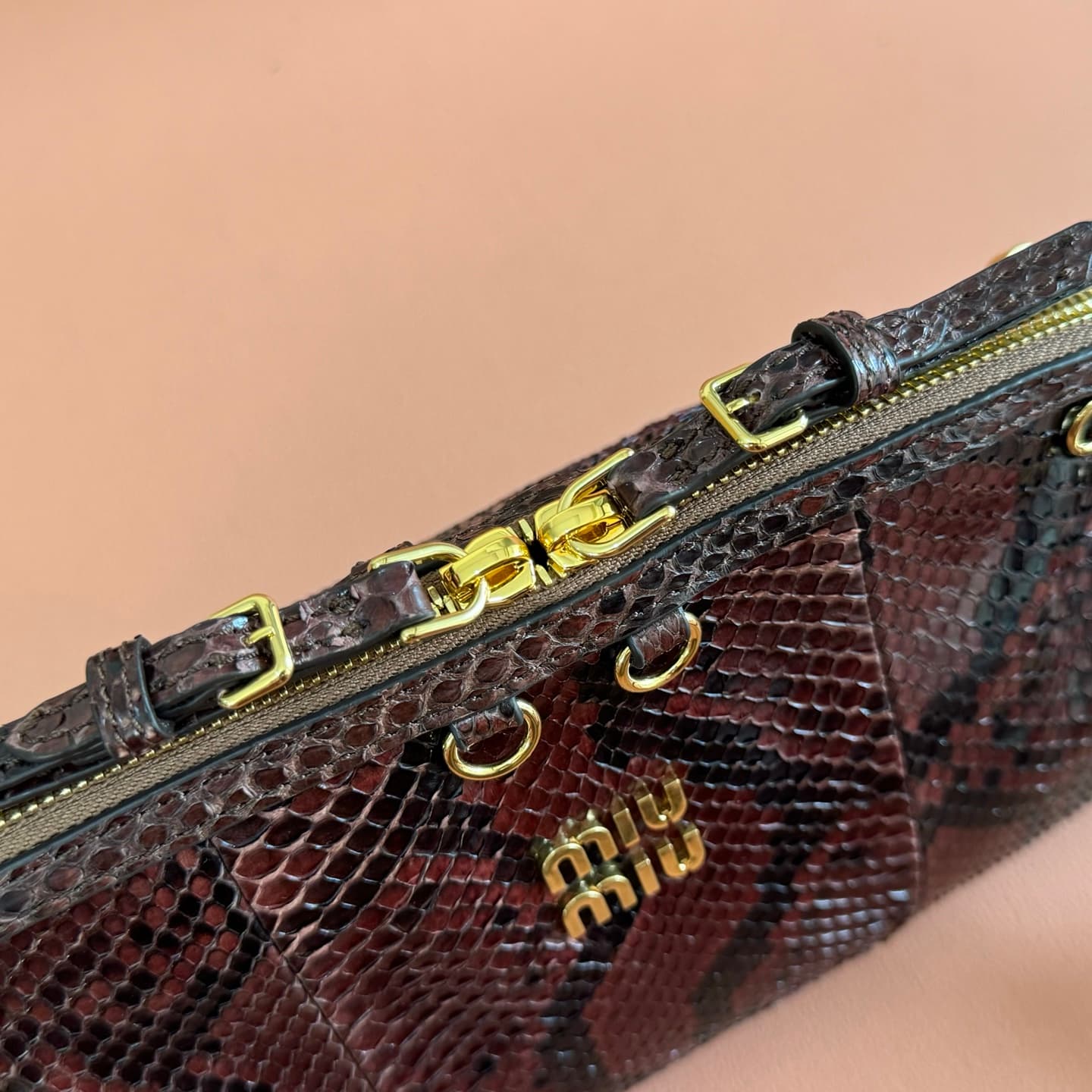 Miu Miu Caprice Tobacco python-print Ayers leather clutch 5BF130 TOP