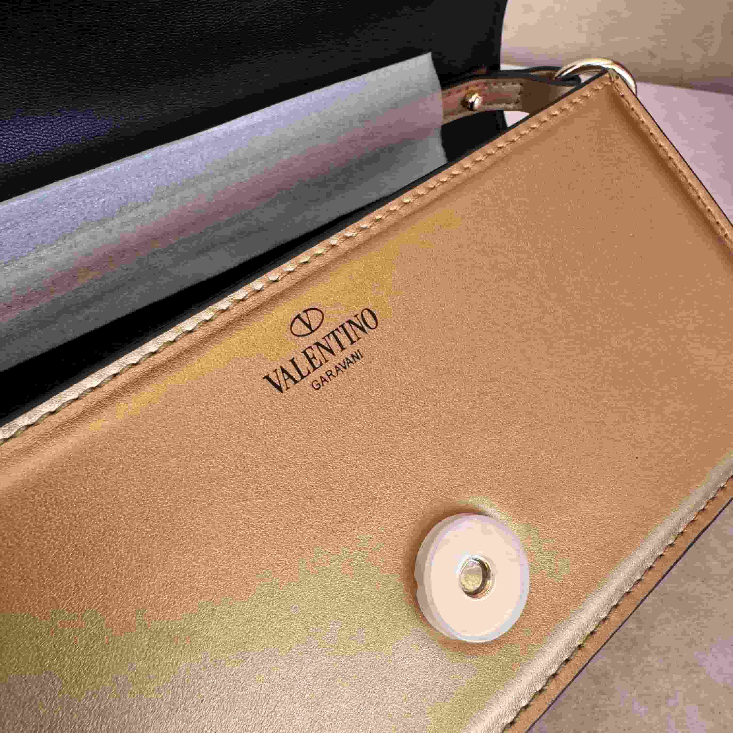 Valentino Garavani Locò Mini leather shoulder bag with crystal VLogo High