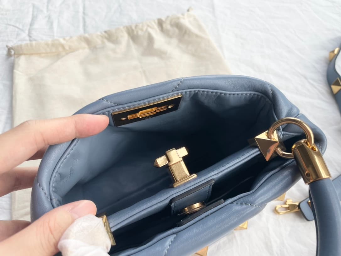 Valentino Garavani Roman Stud leather top handle bag blue high