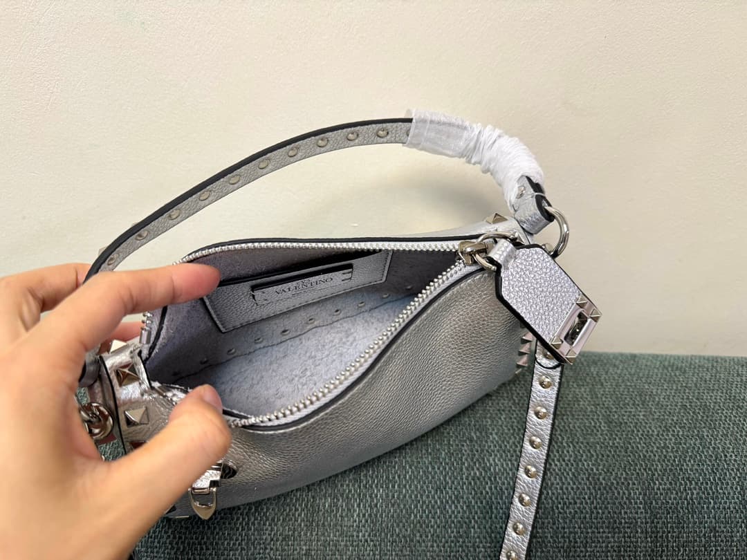 Valentino Garavani Mini Rockstud crossbody bag in metallic silver High