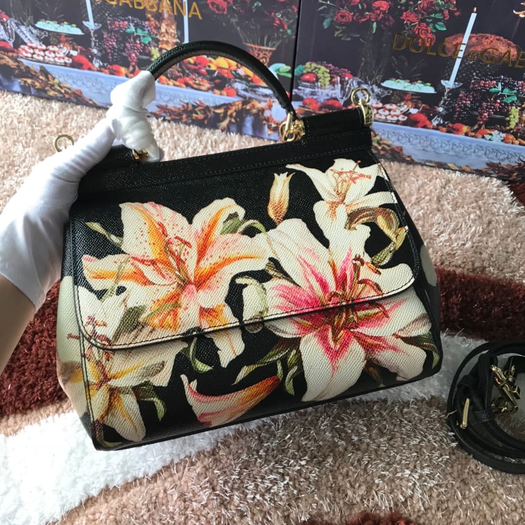 Dolce & Gabbana Miss Sicily top handle bag with vibrant white and pink lily floral print leather High