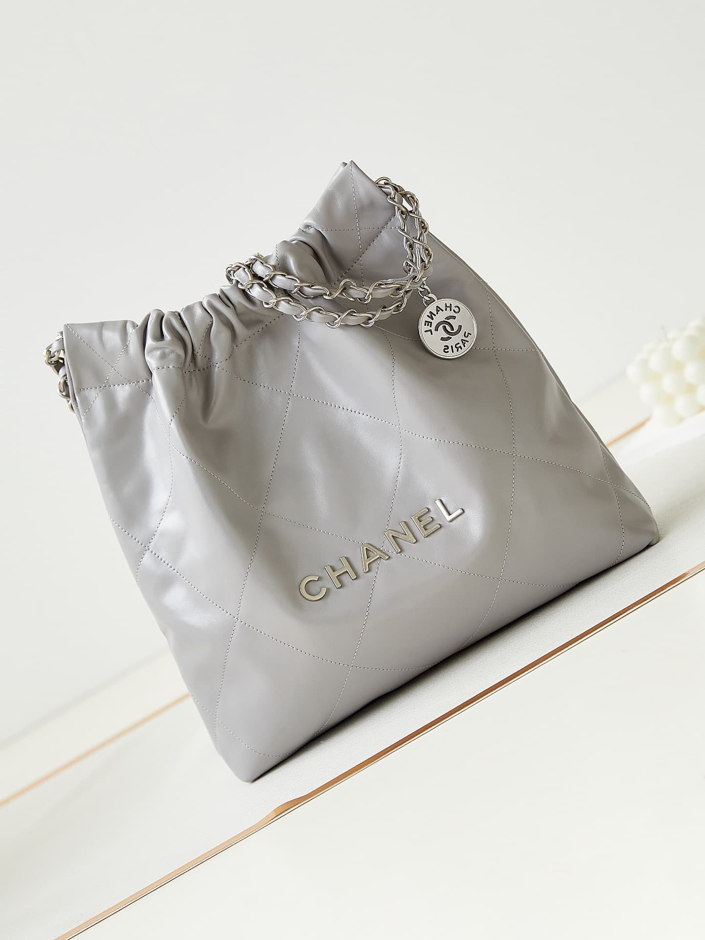 Chanel 22 SMALL HANDBAG Shiny Calfskin & Silver-Tone Metal AS3260 Grey A