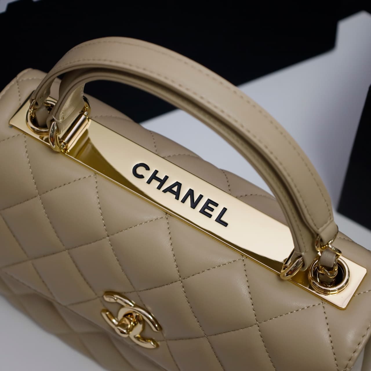 SMALL FLAP BAG WITH TOP HANDLE Lambskin Gold Metal Beige A