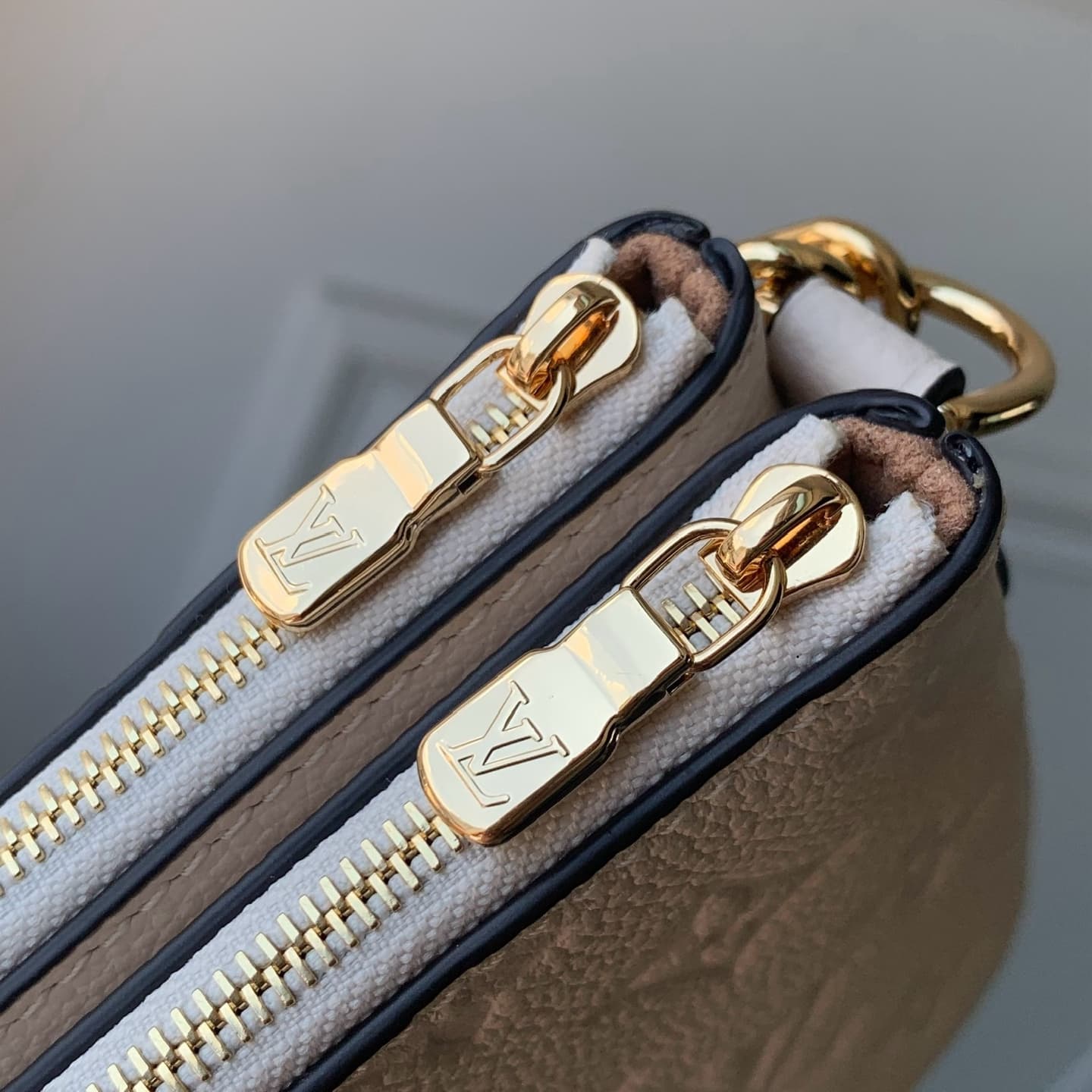 Louis Vuitton Pochette Liv Crème Monogram Empreinte Leather M3A838 High