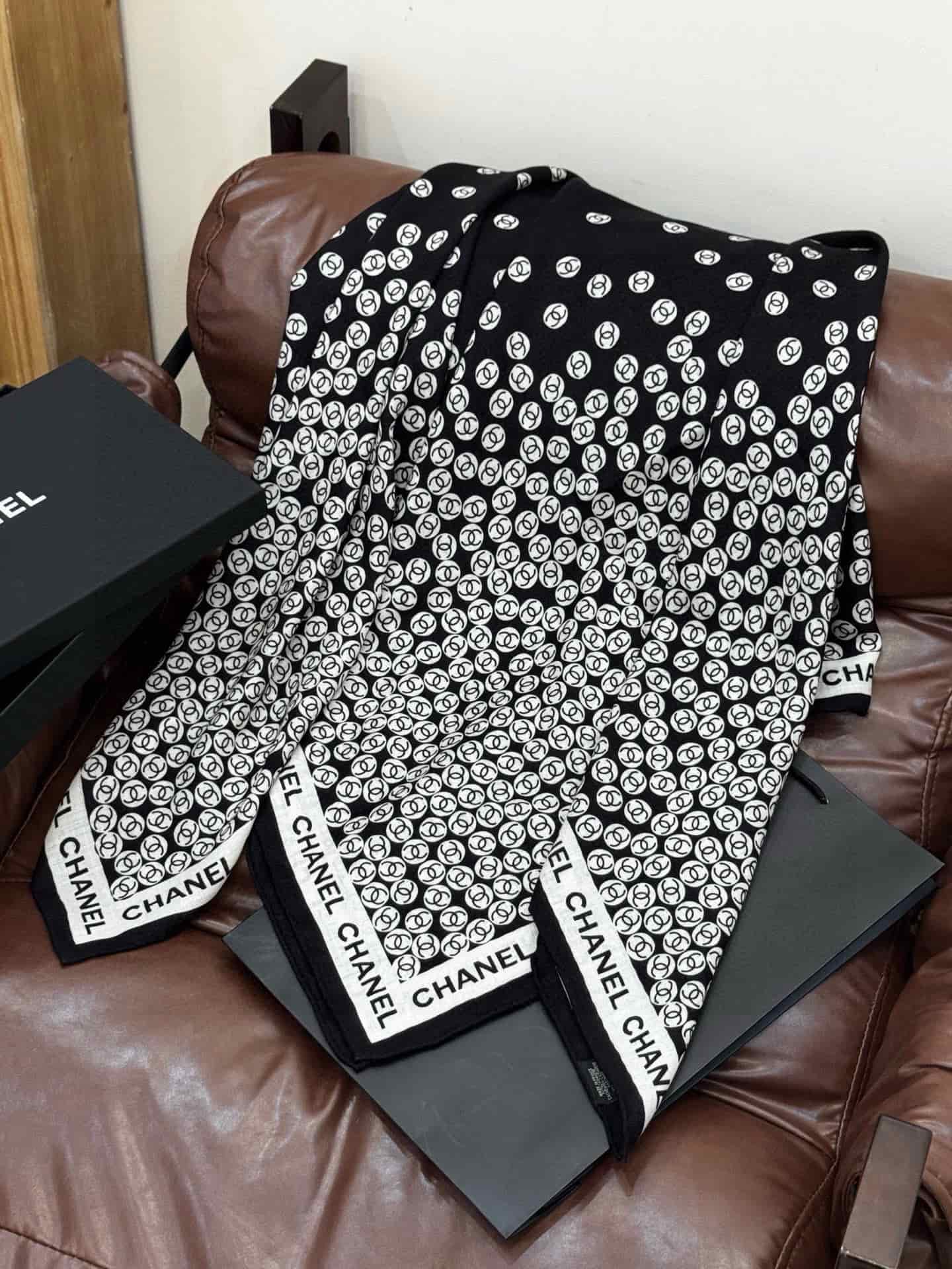 Chanel silk scarf featuring polka dot pattern