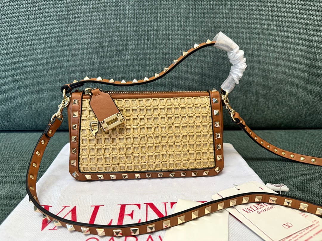 Valentino Garavani Rockstud Raffia and leather crossbody clutch High