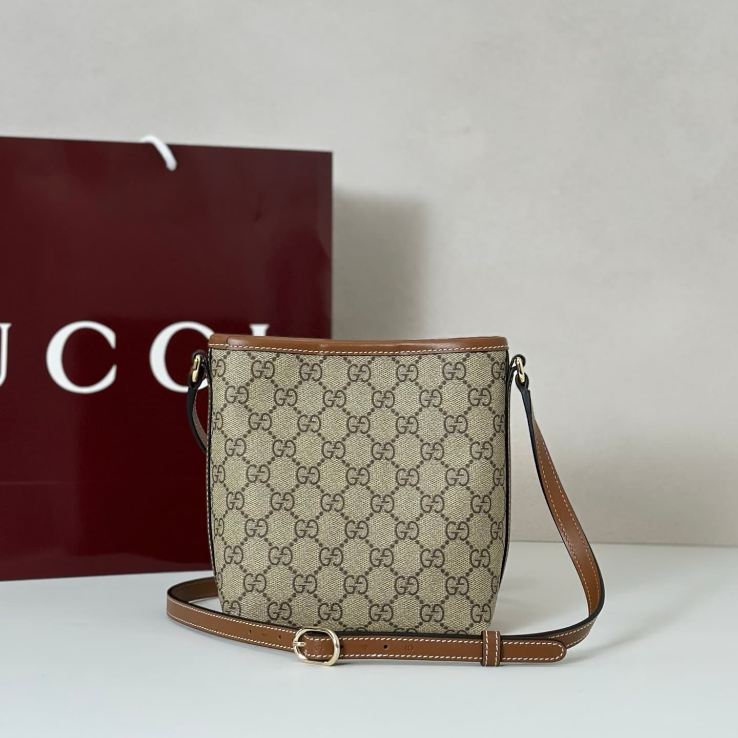 Gucci GG Emblem nano bucket bag 847090 beige and dark brown fabric High