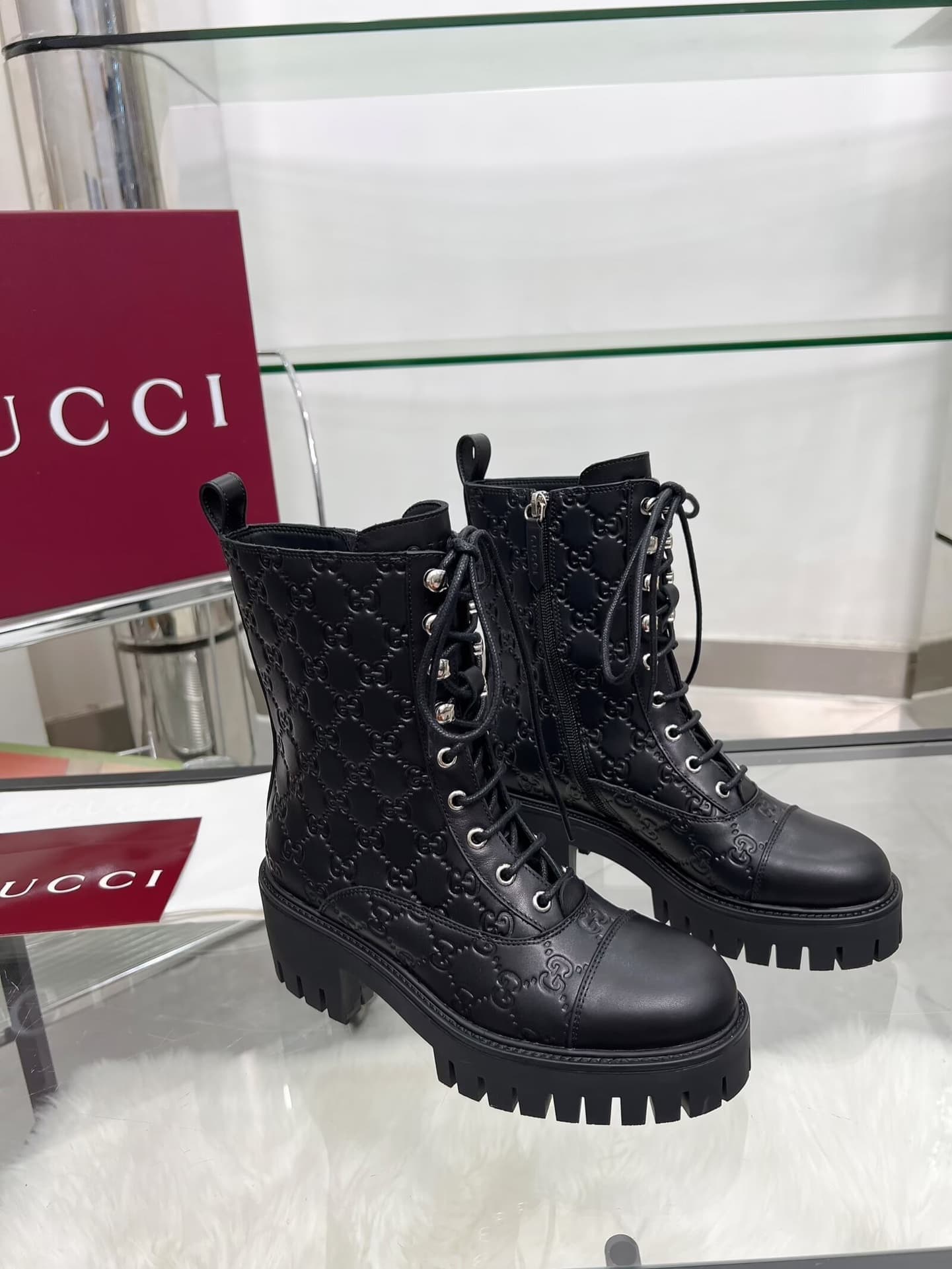 Gucci Women's lace-up ankle boots with GG