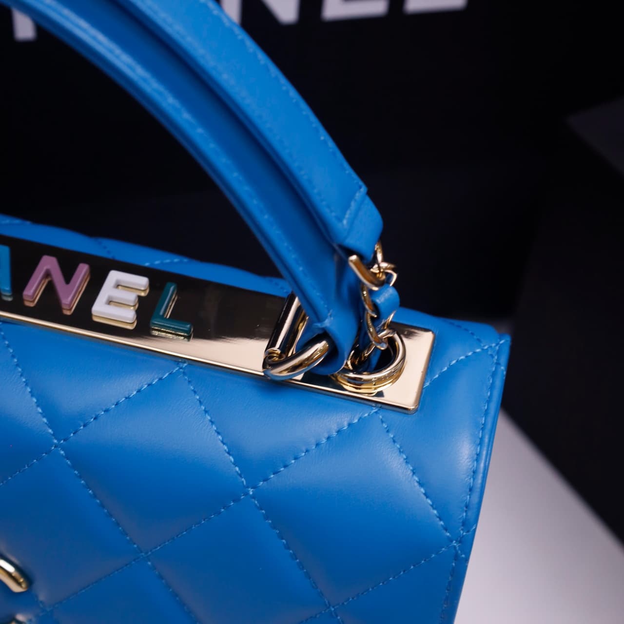 SMALL FLAP BAG WITH TOP HANDLE Lambskin Gold Metal Blue A