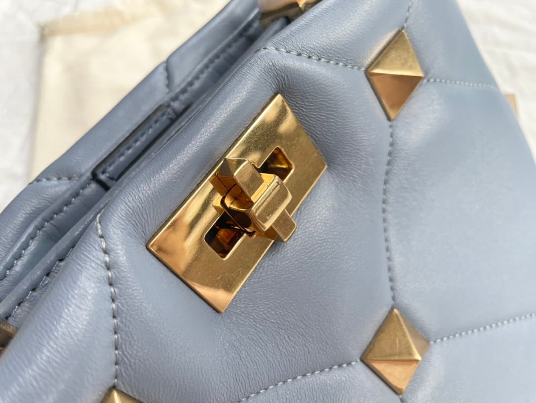 Valentino Garavani Roman Stud leather top handle bag blue high