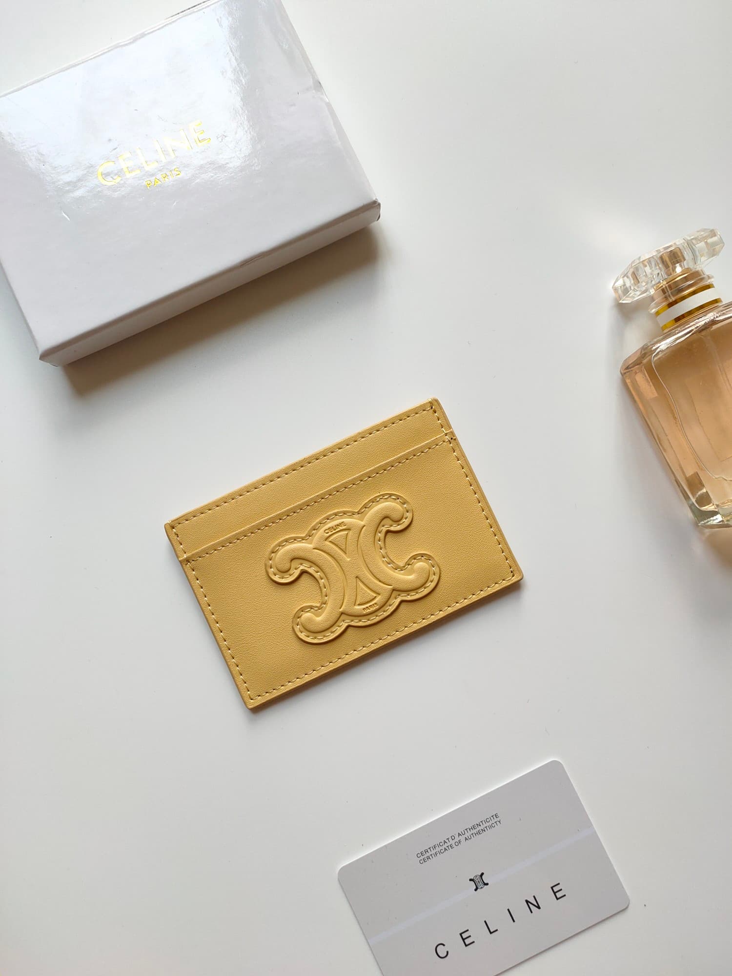 Celine Triomphe card holder in yellow shiny calfskin leather 10B703 High