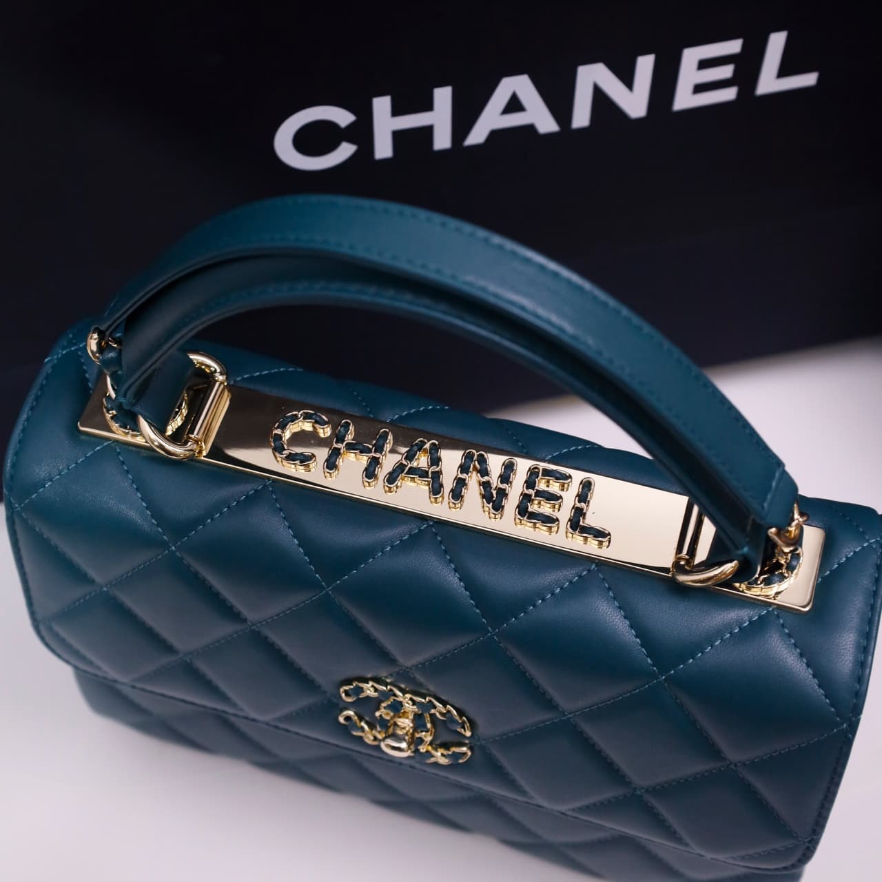 SMALL FLAP BAG WITH TOP HANDLE Lambskin Gold Metal Deep Blue A