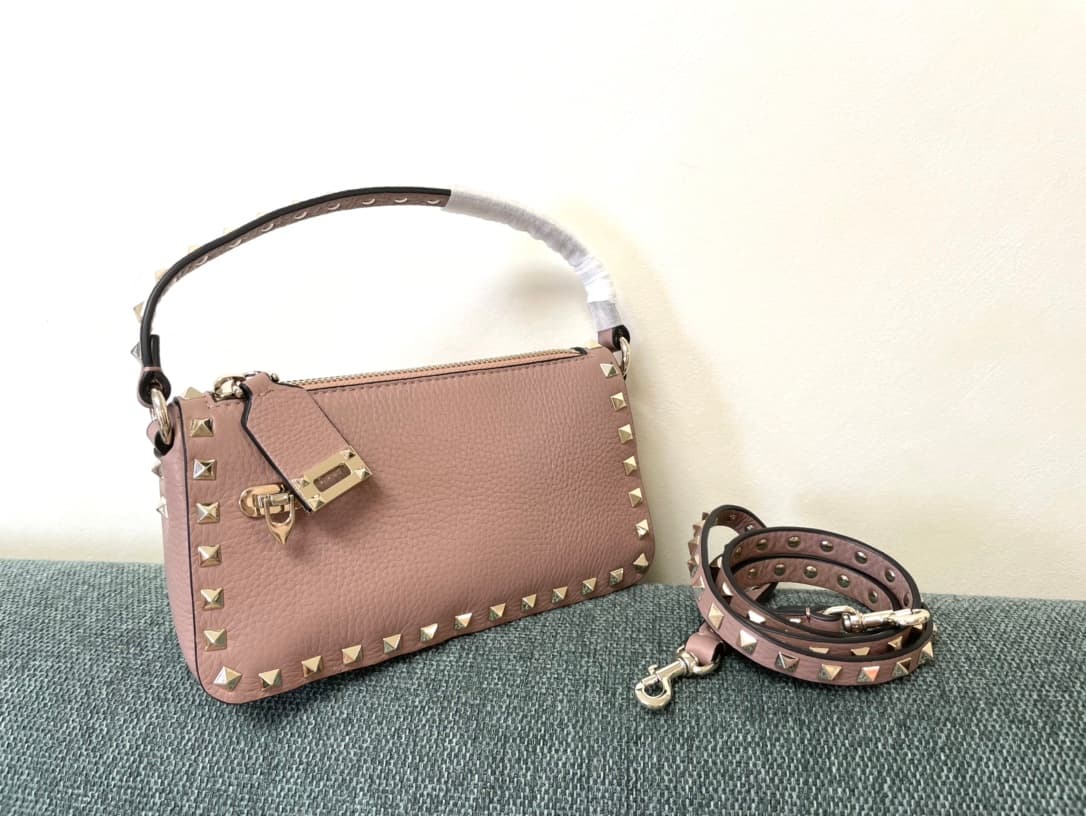 Valentino Garavani Mini Rockstud crossbody bag in powder pink Grained Calfskin High