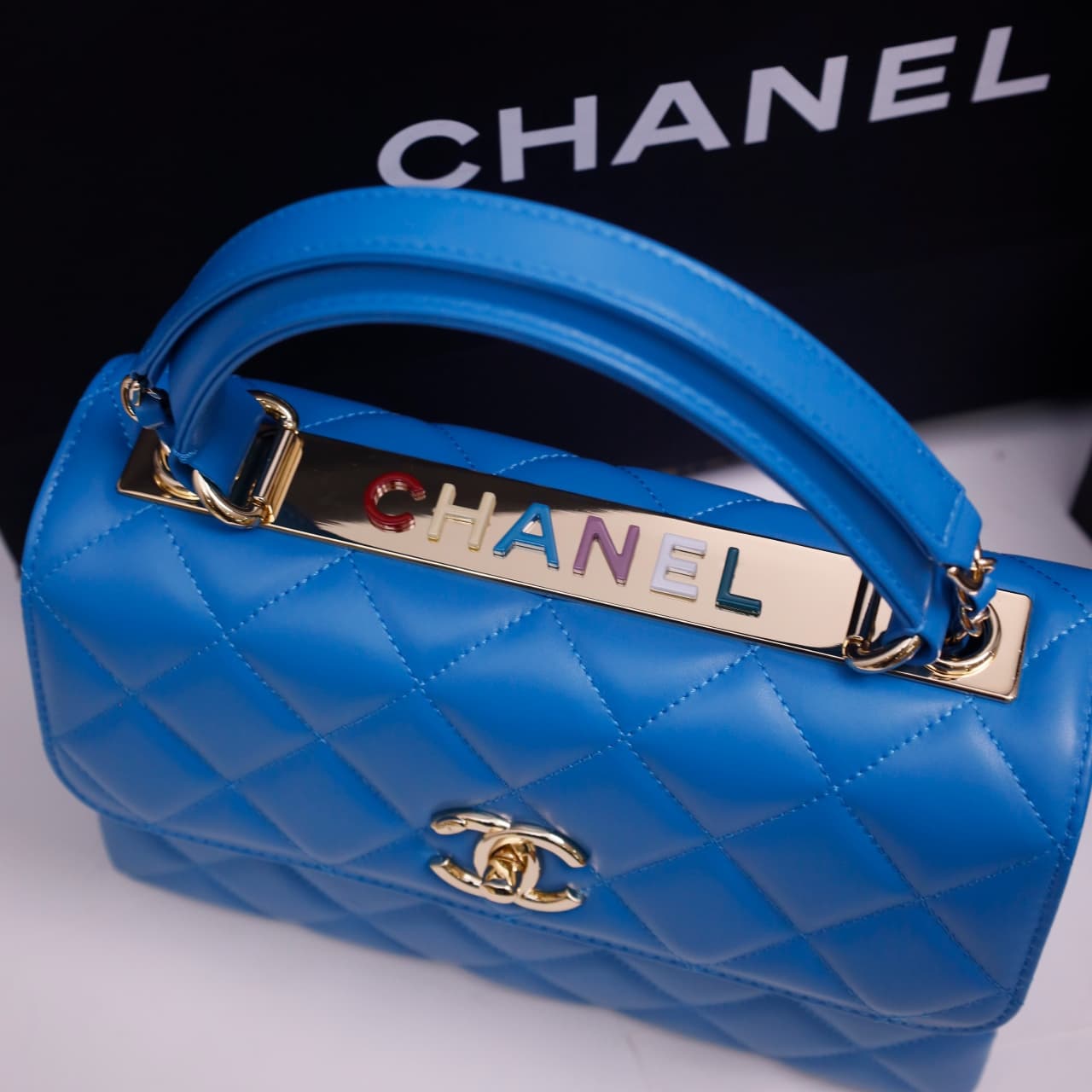 SMALL FLAP BAG WITH TOP HANDLE Lambskin Gold Metal Blue A