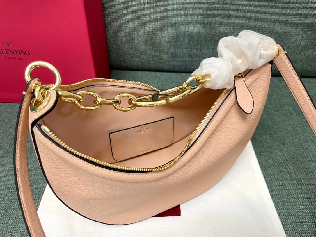 Valentino Garavani VLogo Moon small hobo bag in Light Pink grained calfskin High