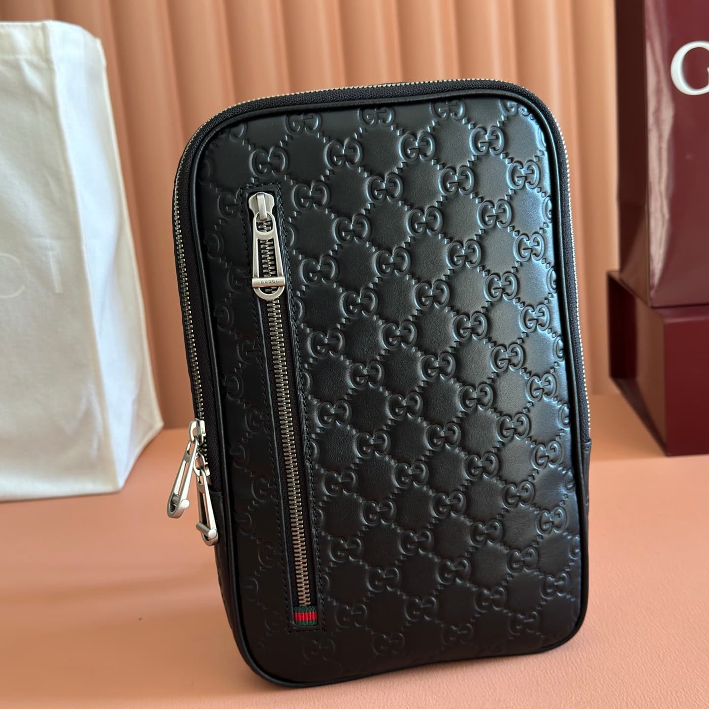 Gucci GG Emblem small crossbody bag Black embossed GG smooth leather 862915 High