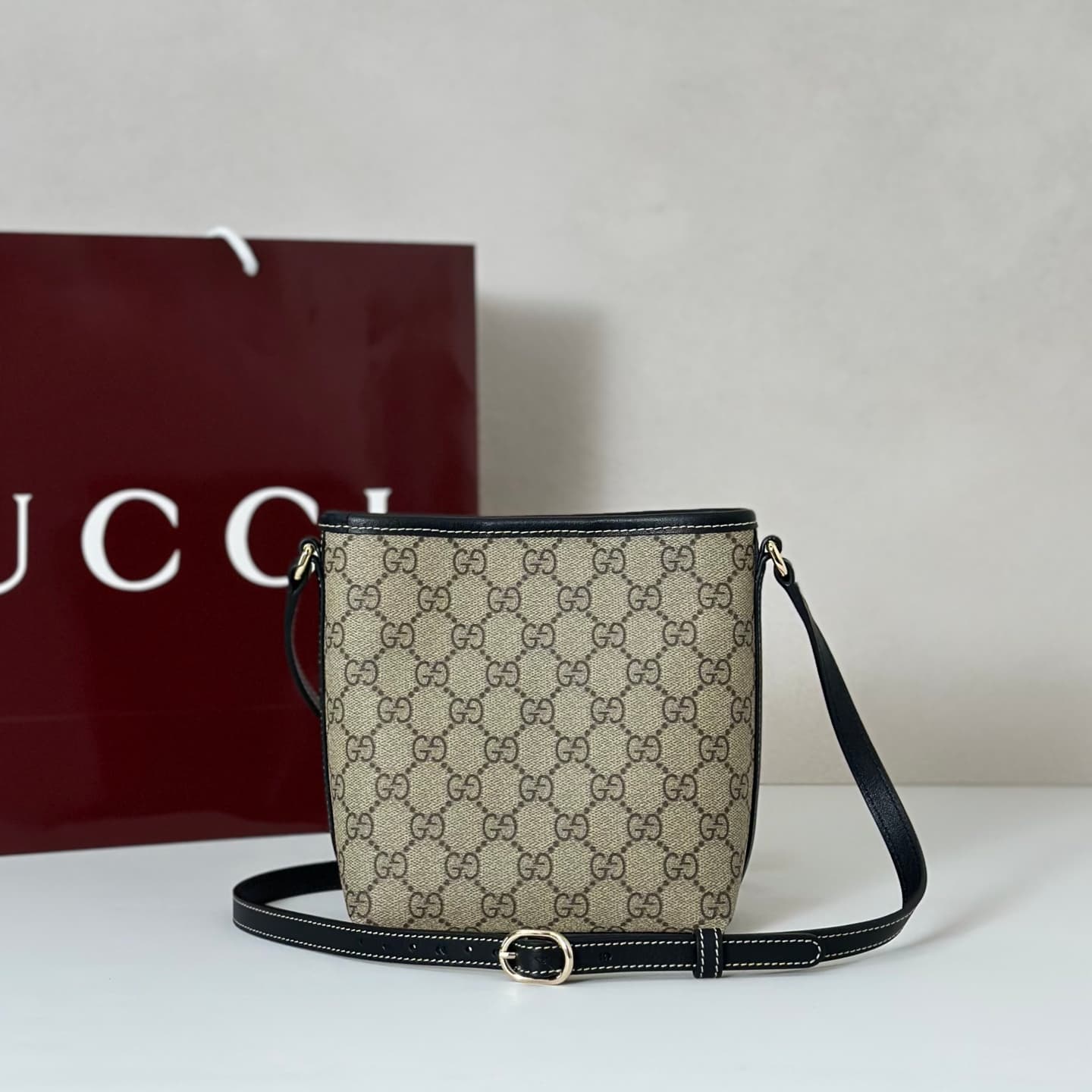 Gucci GG Emblem nano bucket bag 847090 beige and dark brown fabric High
