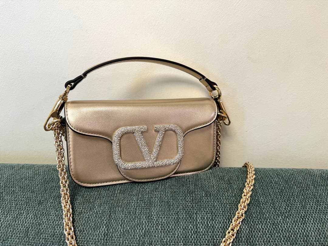 Valentino Garavani Locò Mini leather shoulder bag with crystal VLogo High
